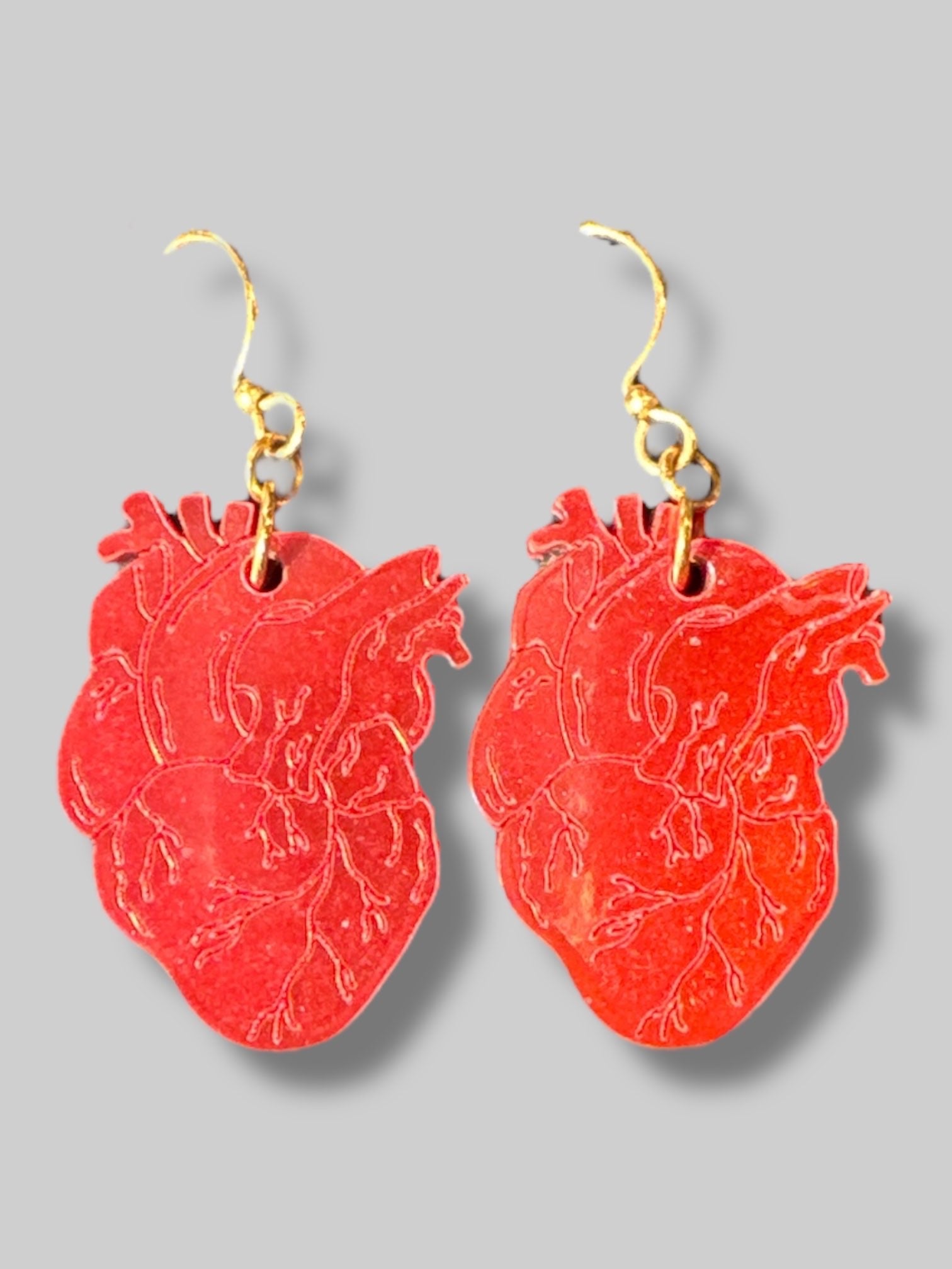 Holographic anatomically correct dangle heart earrings