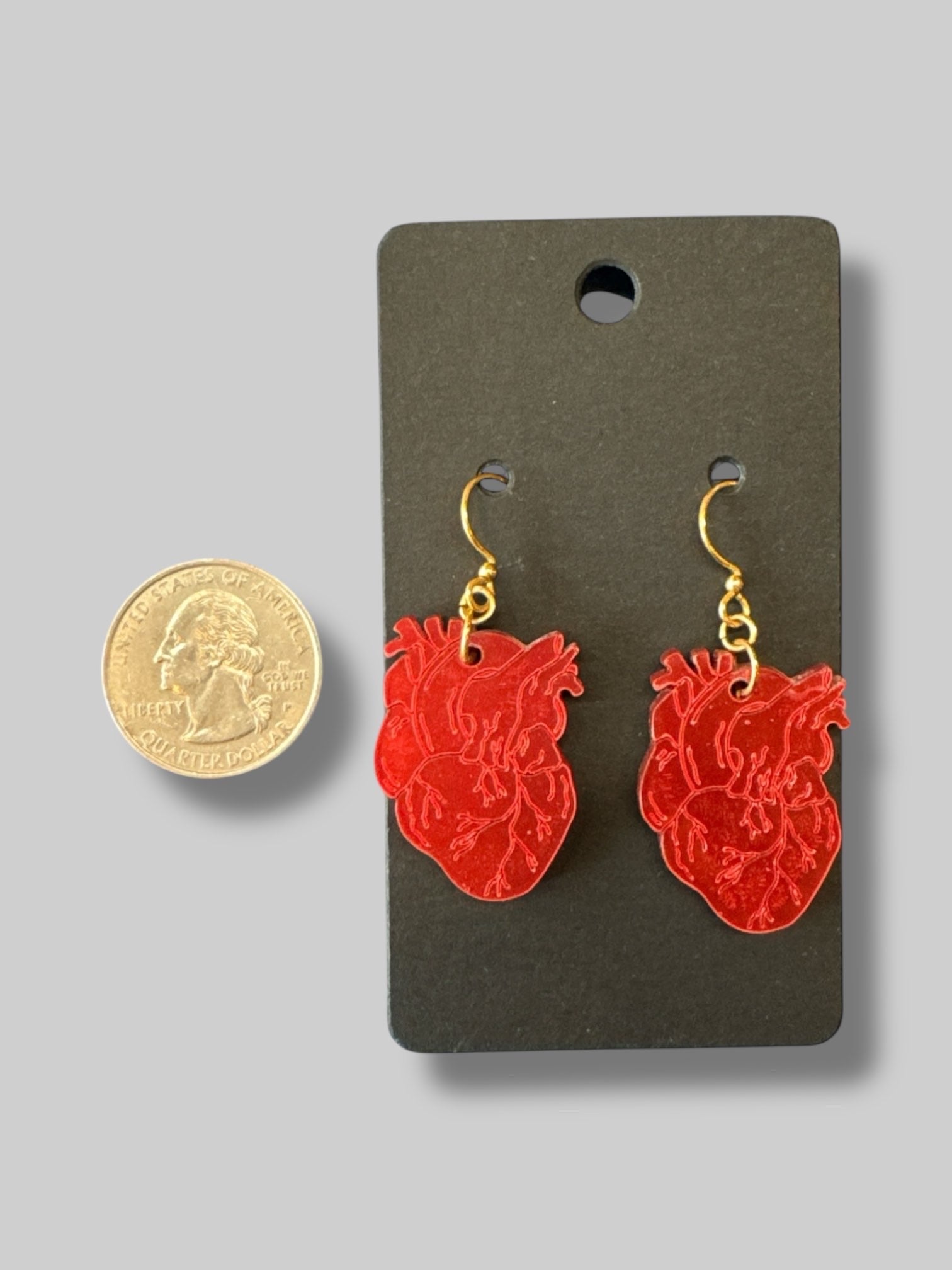 Holographic anatomically correct dangle heart earrings