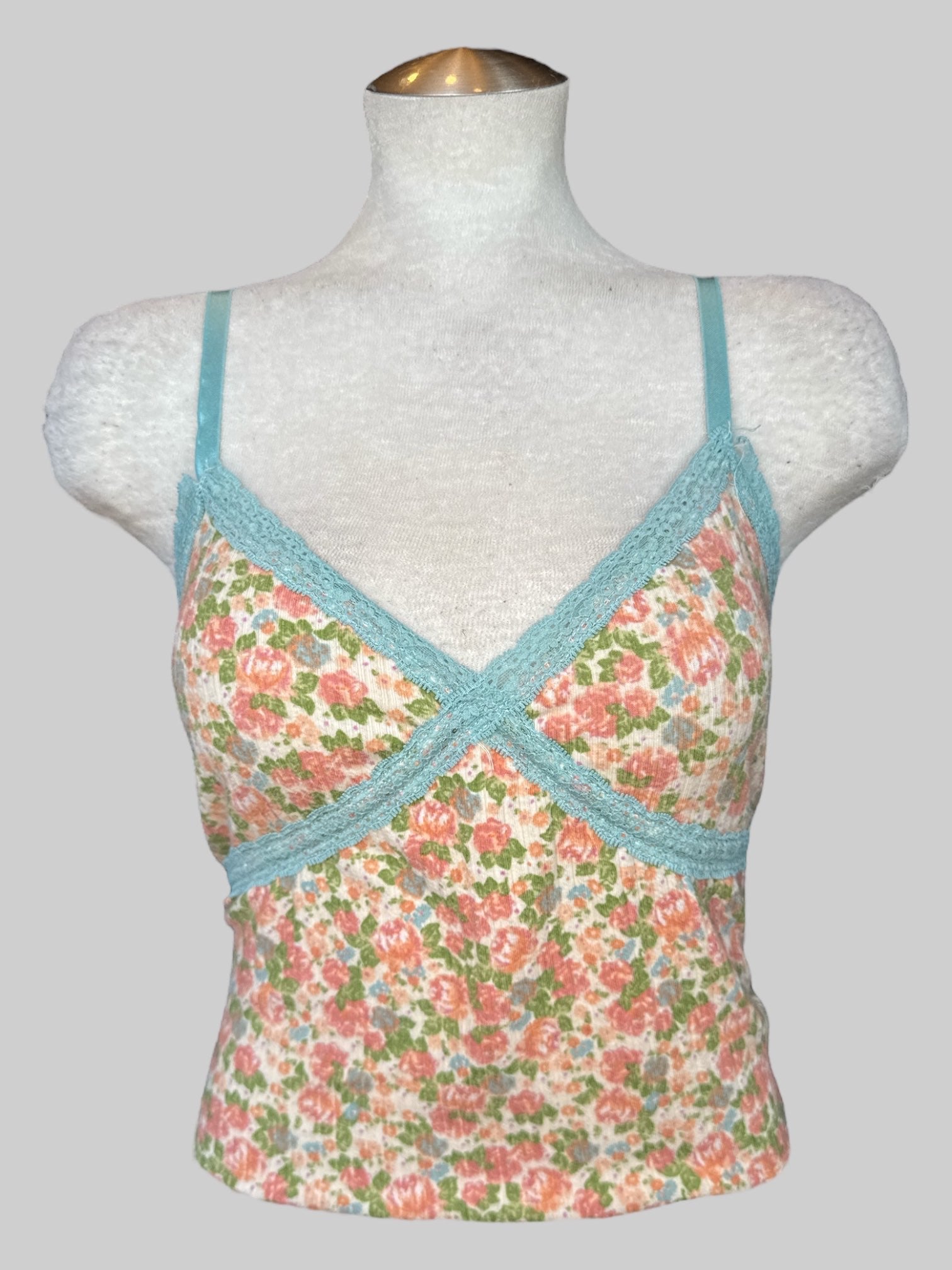 0X Cream top with multicolored florals, and blue lace trim