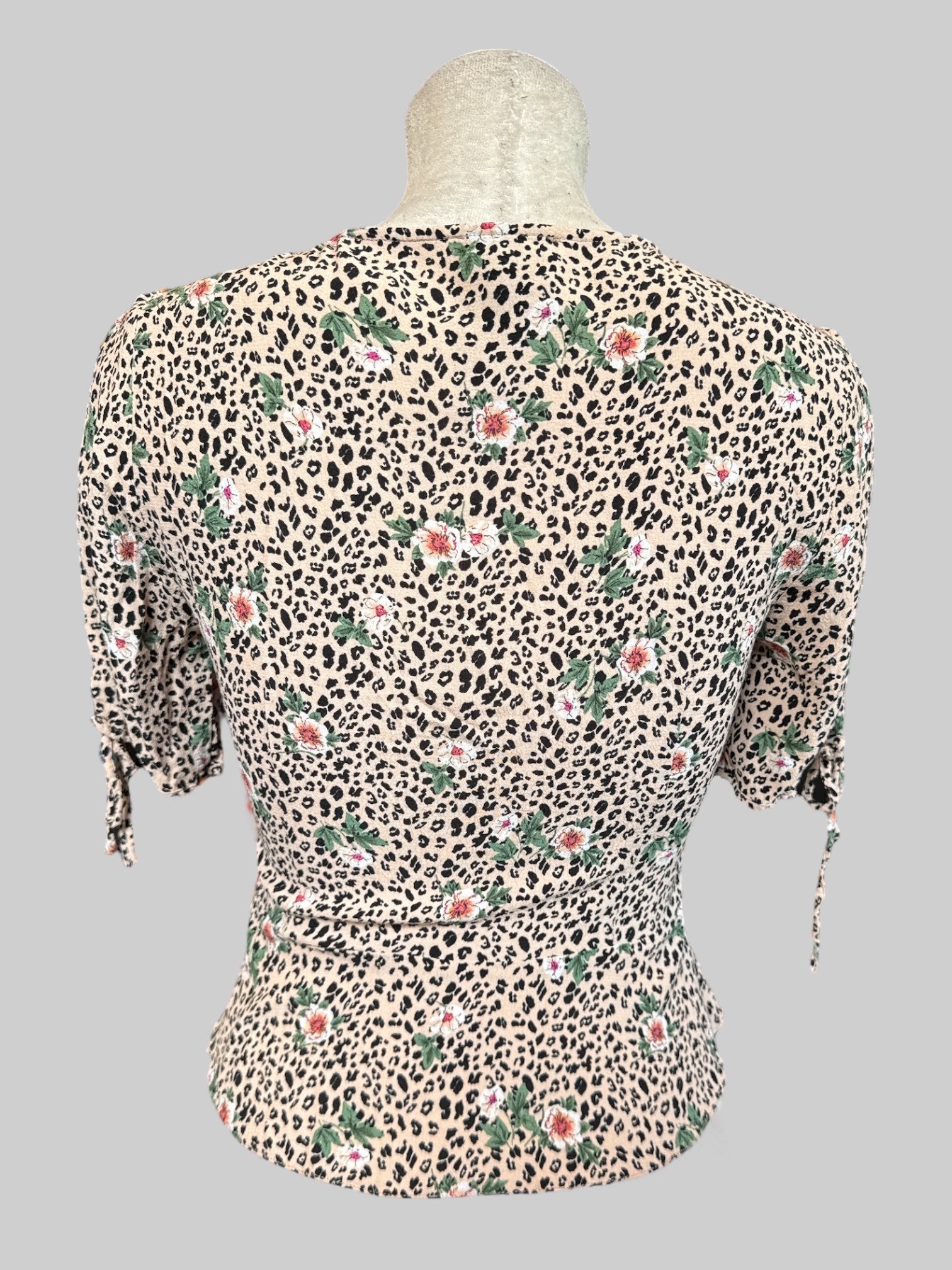S Tan short sleeve button up cardigan with animal print and florals
