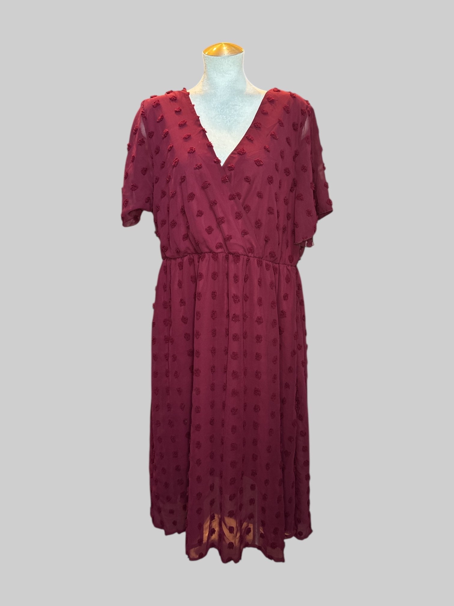 1X Burgundy textured faux wrap dress with sheer overlay and stretchy waste