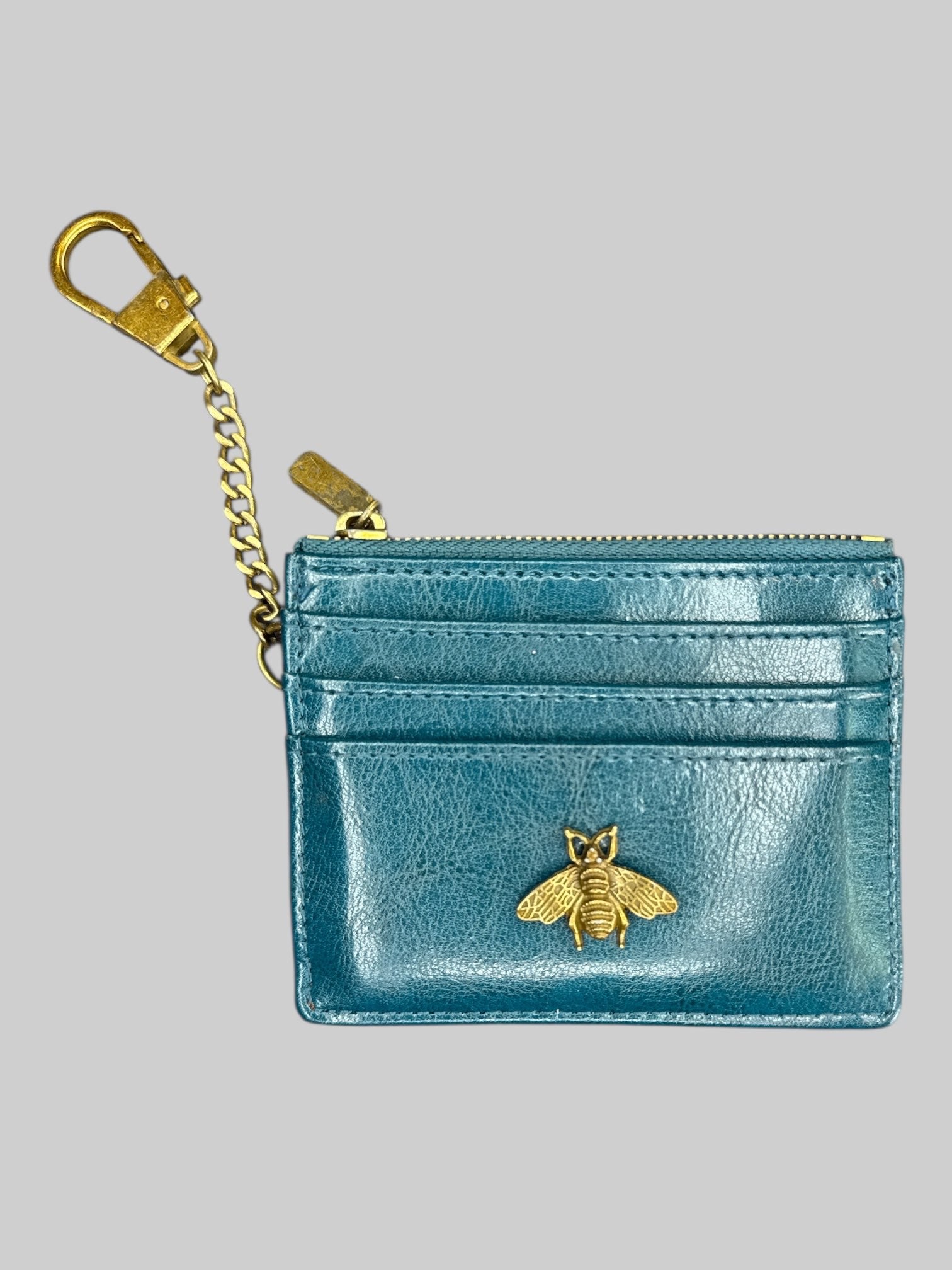 Blue keychain wallet with bee
