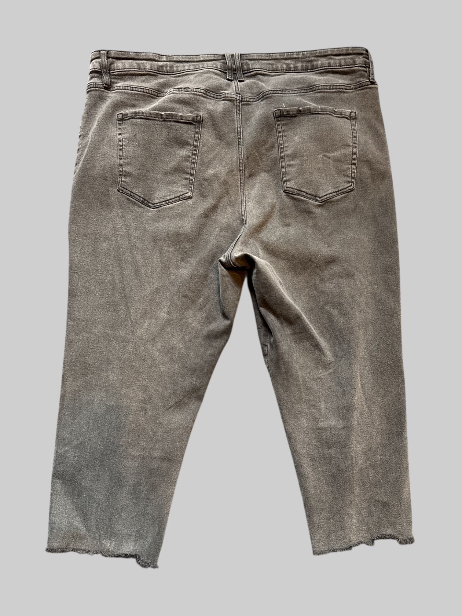 3X grey stretchy denim pants with distressed hem