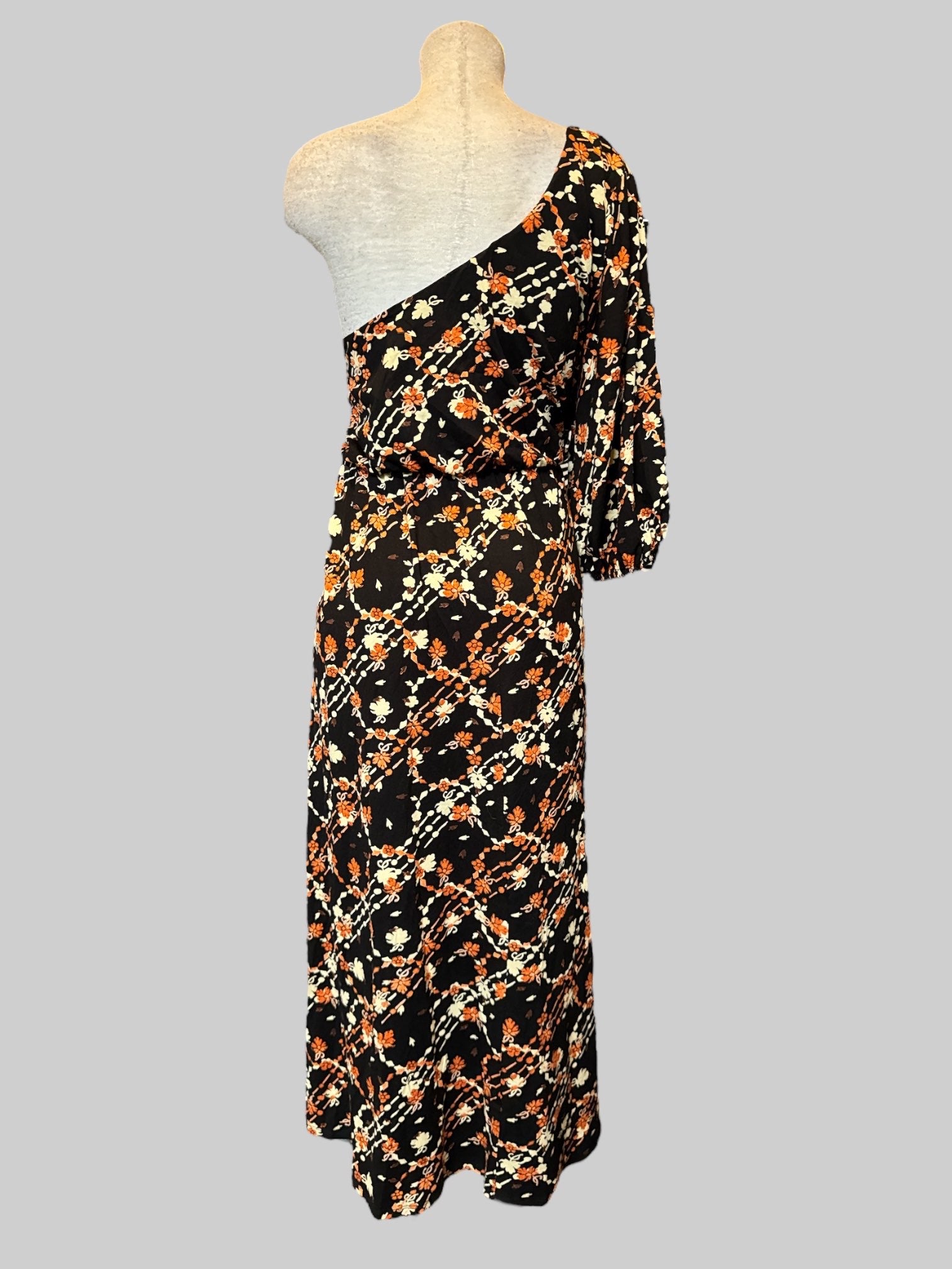 4X Flowy black one shoulder dress with  orange , white, and brown florals