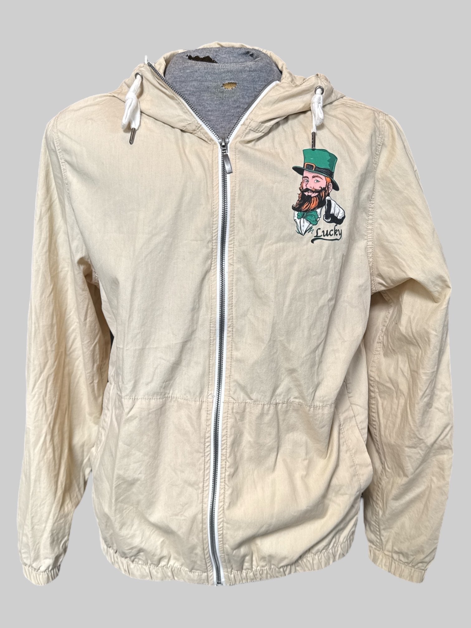 L tan zip up hooded jacket with lucky leprechaun