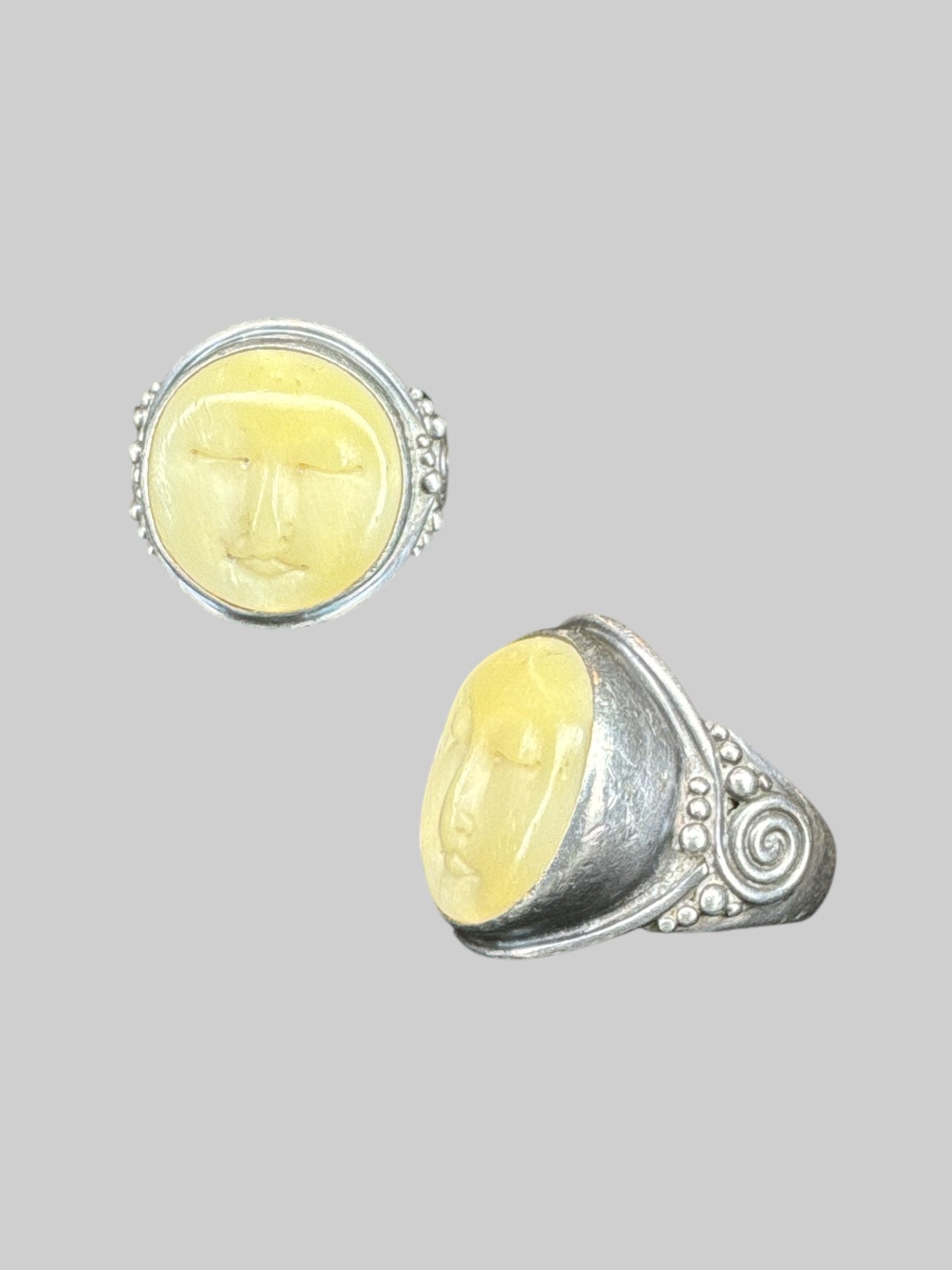 Size 7 vintage sterling silver ring with carved face adornment