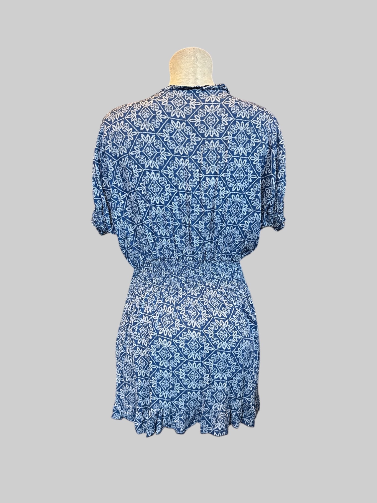 XL blue and white dress with geometric pattern, buttons on front, and shirred waist