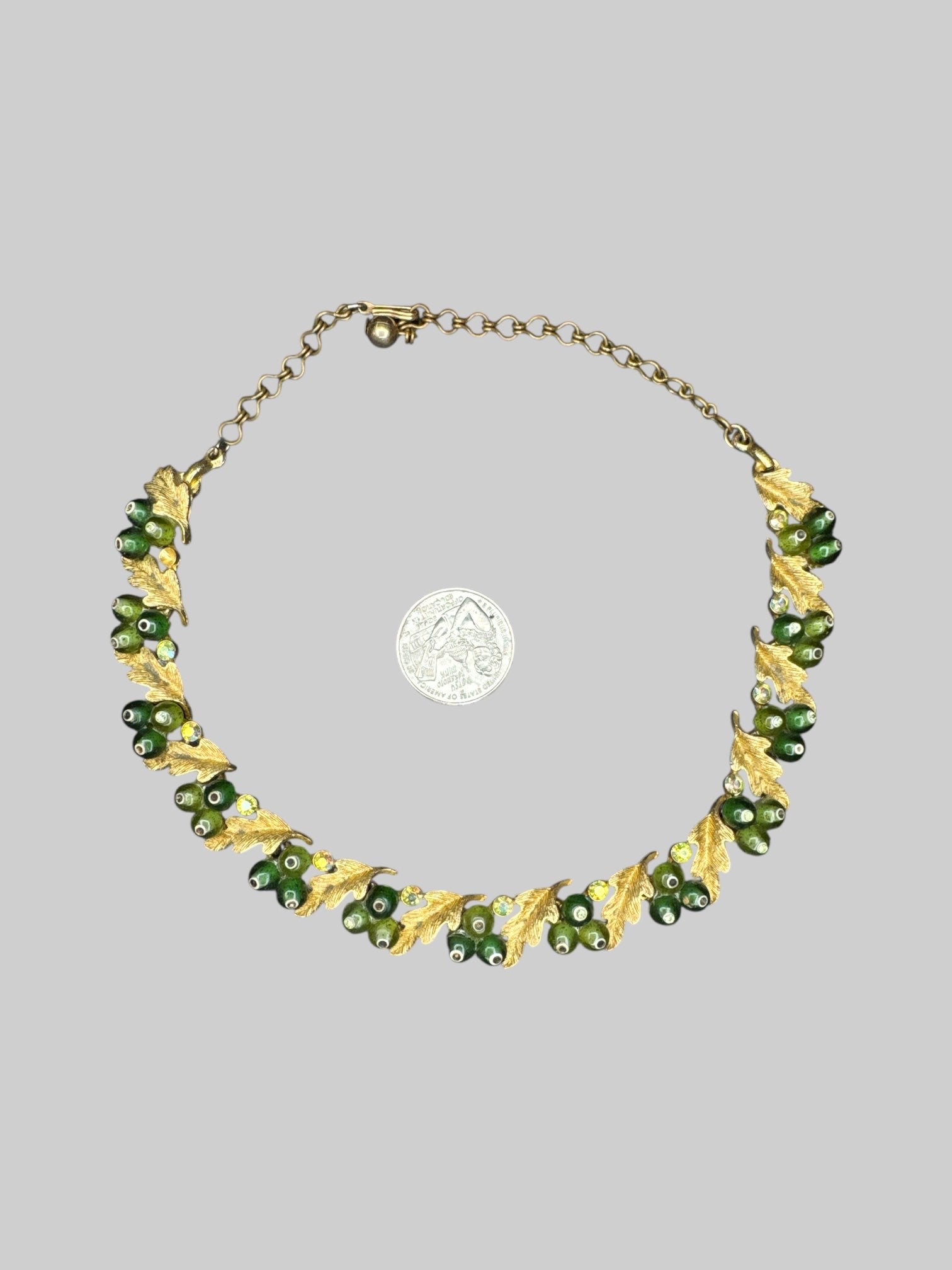 B.S.K. designer vintage 50’s/60s gold tone leaf necklace with green gems