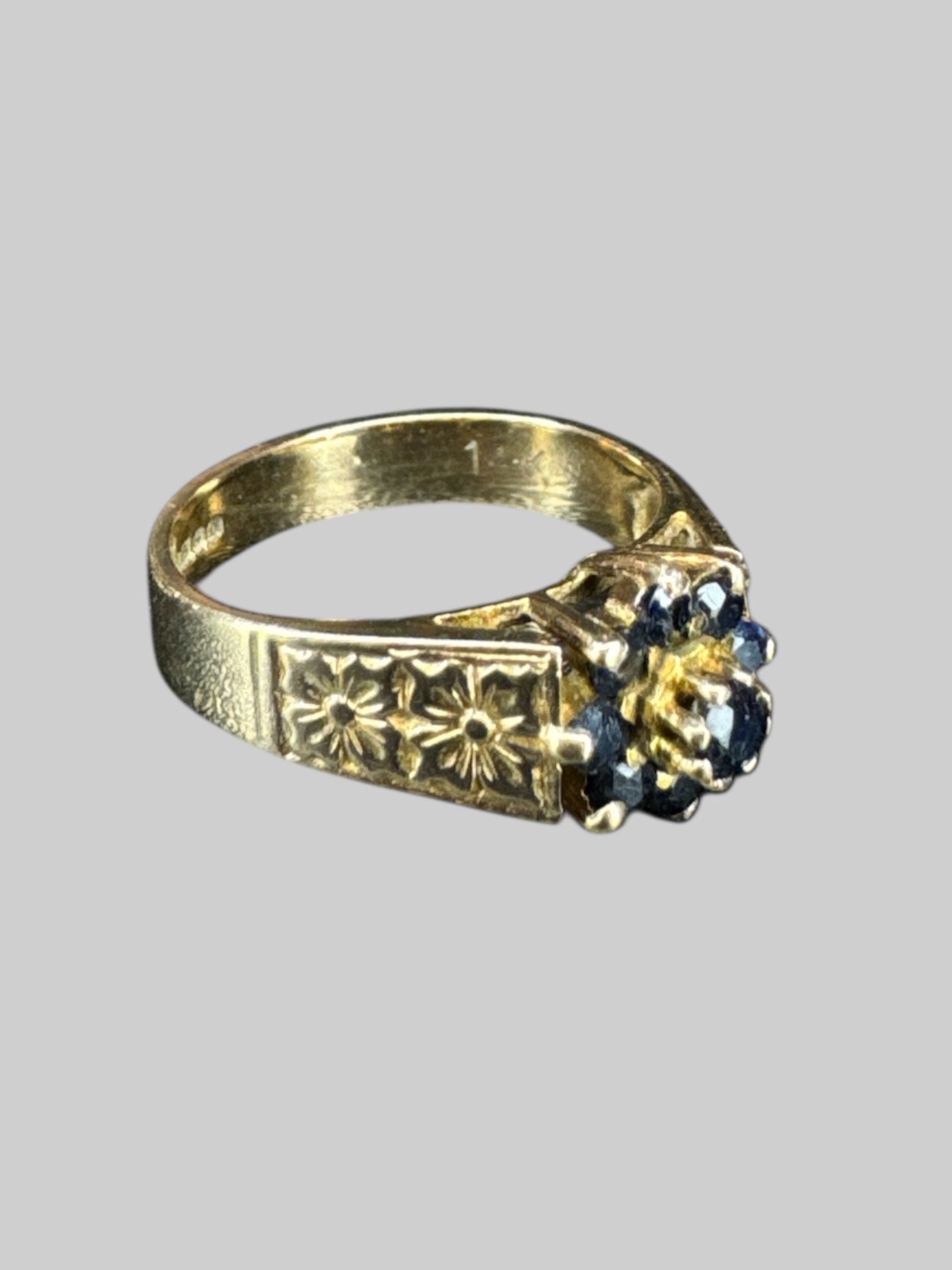 Size 7 Genuine gold ring with black gems
