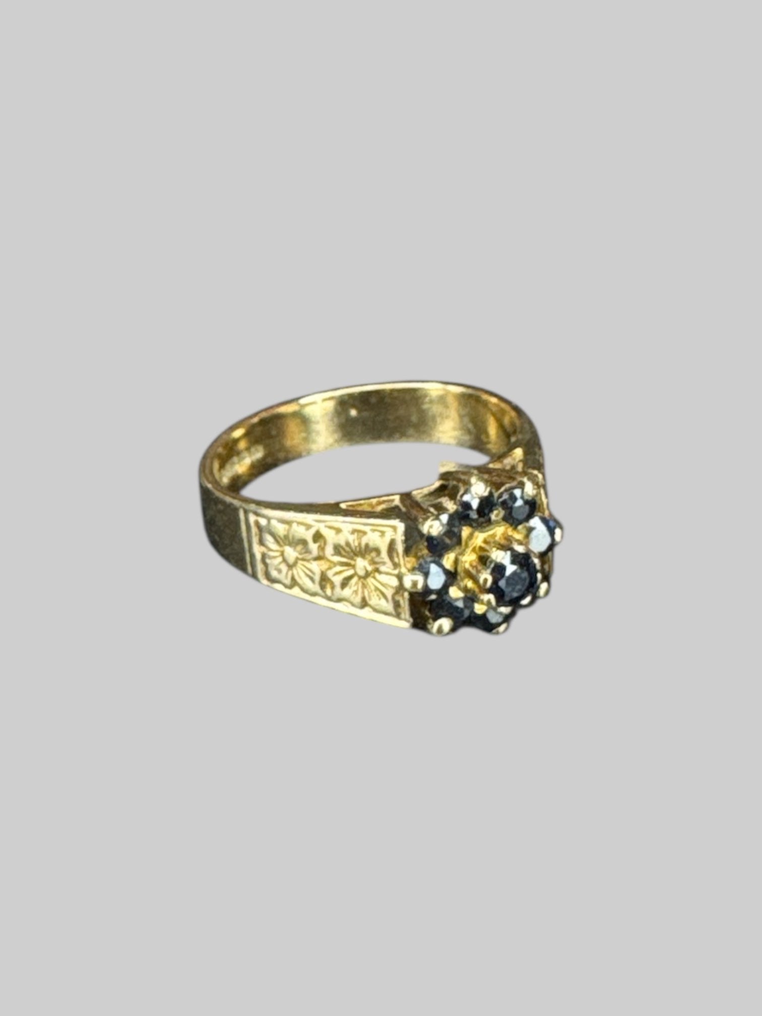 Size 7 Genuine gold ring with black gems