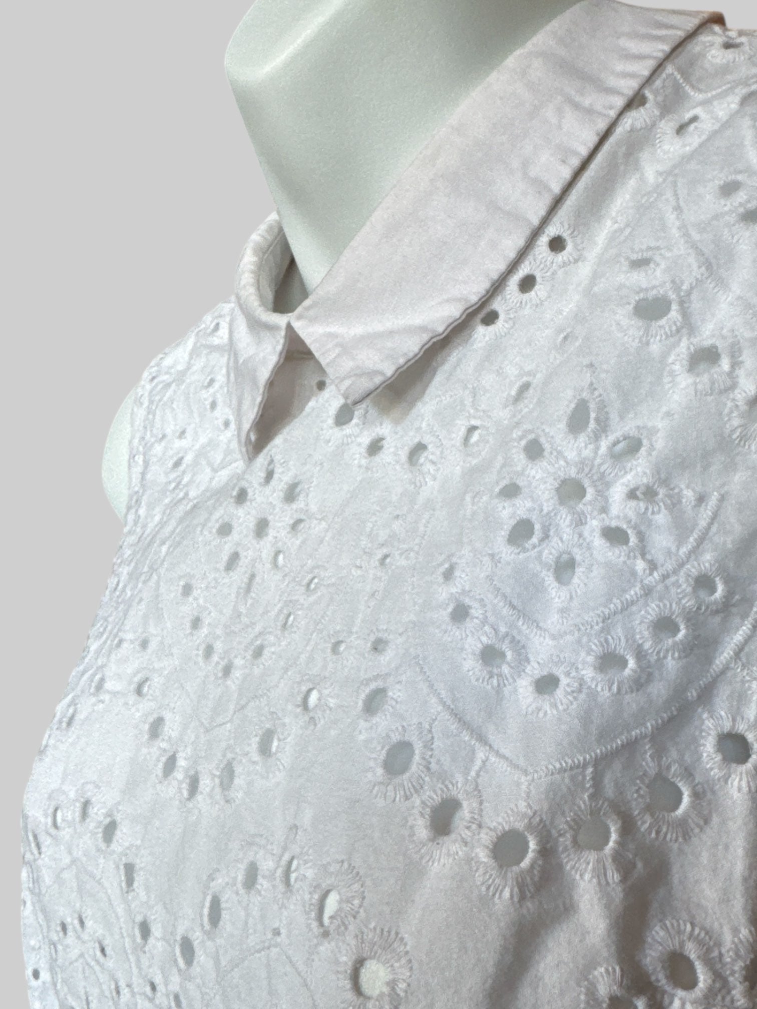 S White collared sleeveless top with eyelet pattern