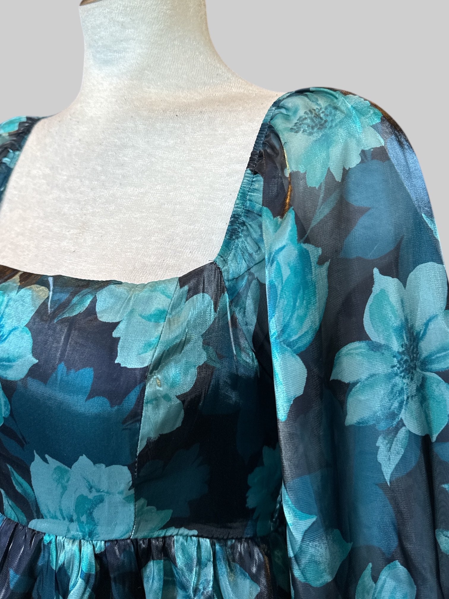 S Black and blue dress with florals, sheer sleeves, and shirred bodice
