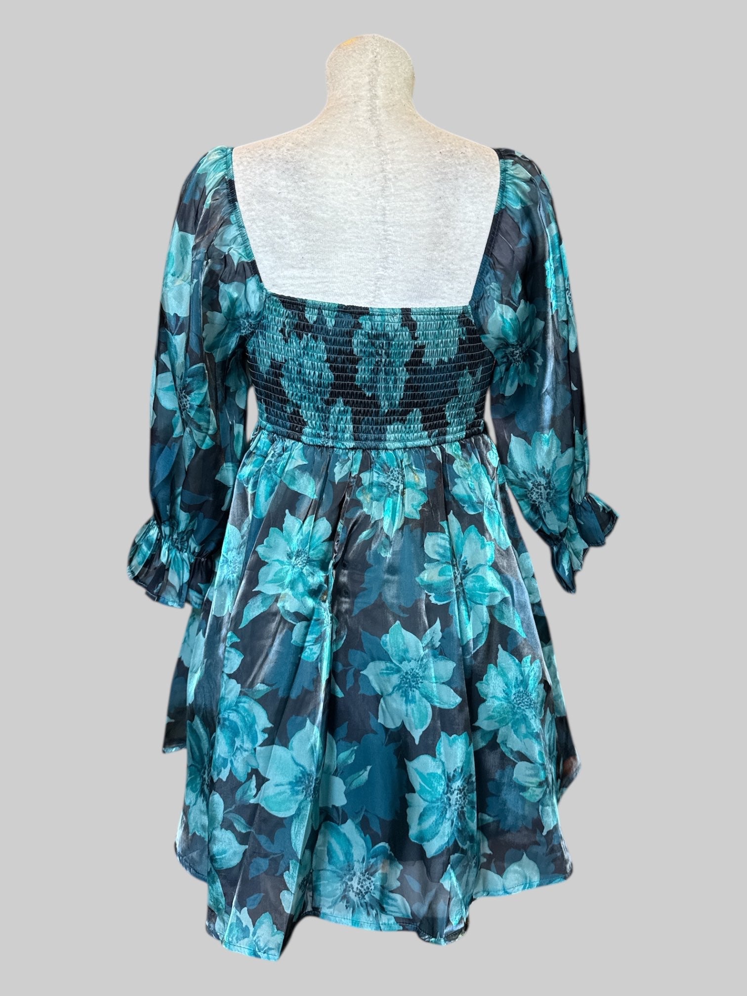 S Black and blue dress with florals, sheer sleeves, and shirred bodice