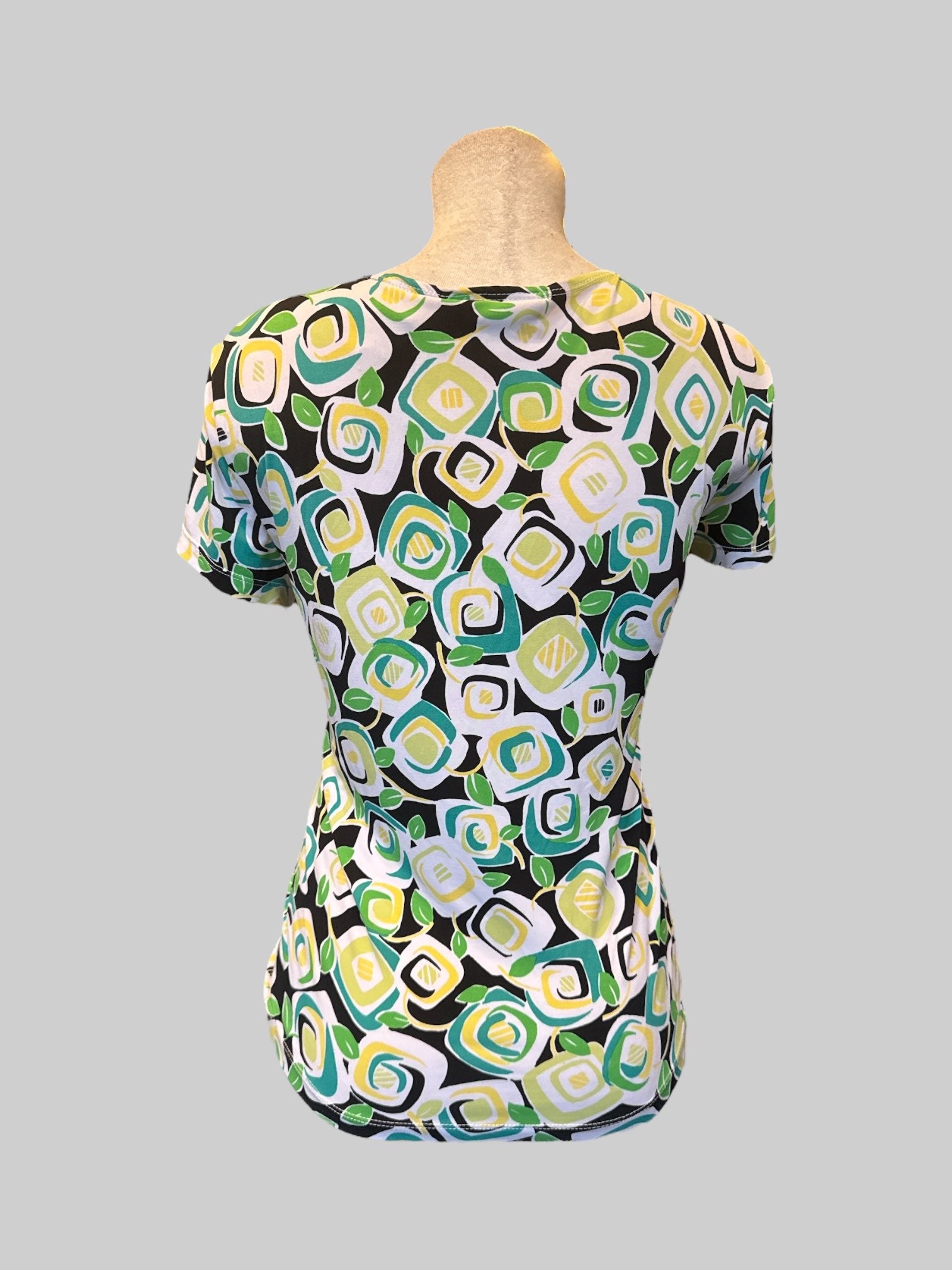 XL Black stretchy top with blue yellow and green botanical design and faux cammy