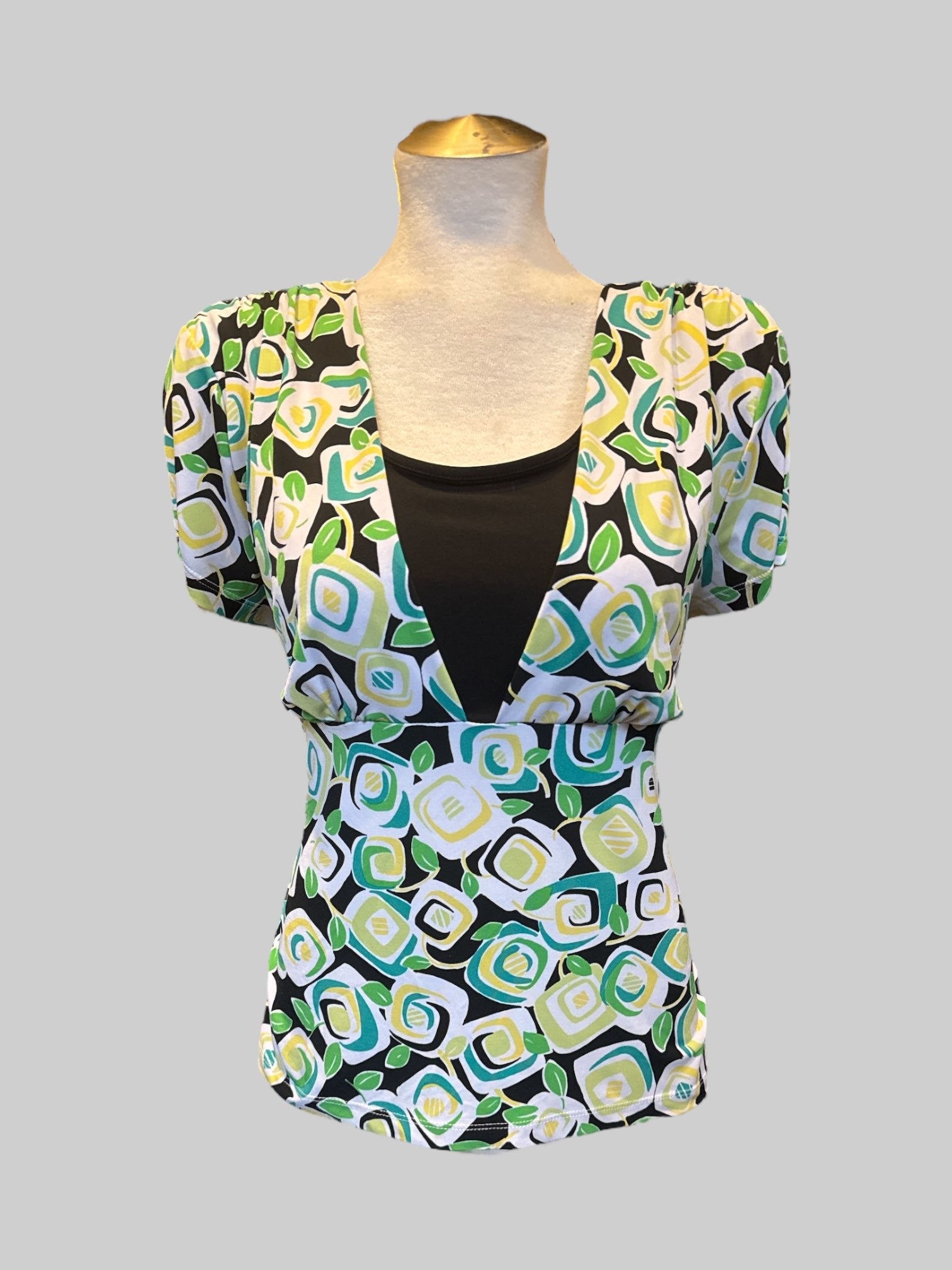 XL Black stretchy top with blue yellow and green botanical design and faux cammy