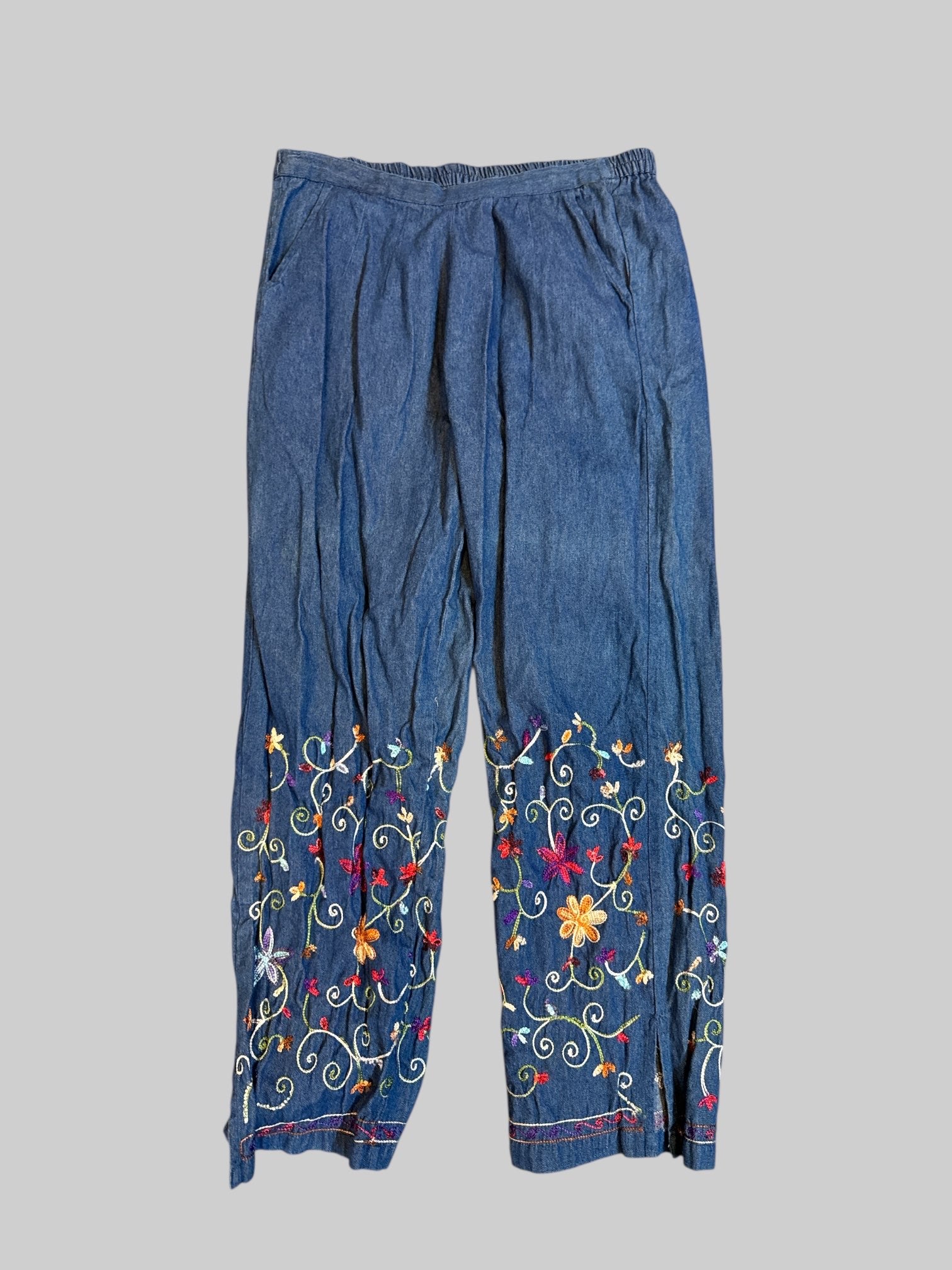 L vintage denim pants with embroidered bottoms and sides slit