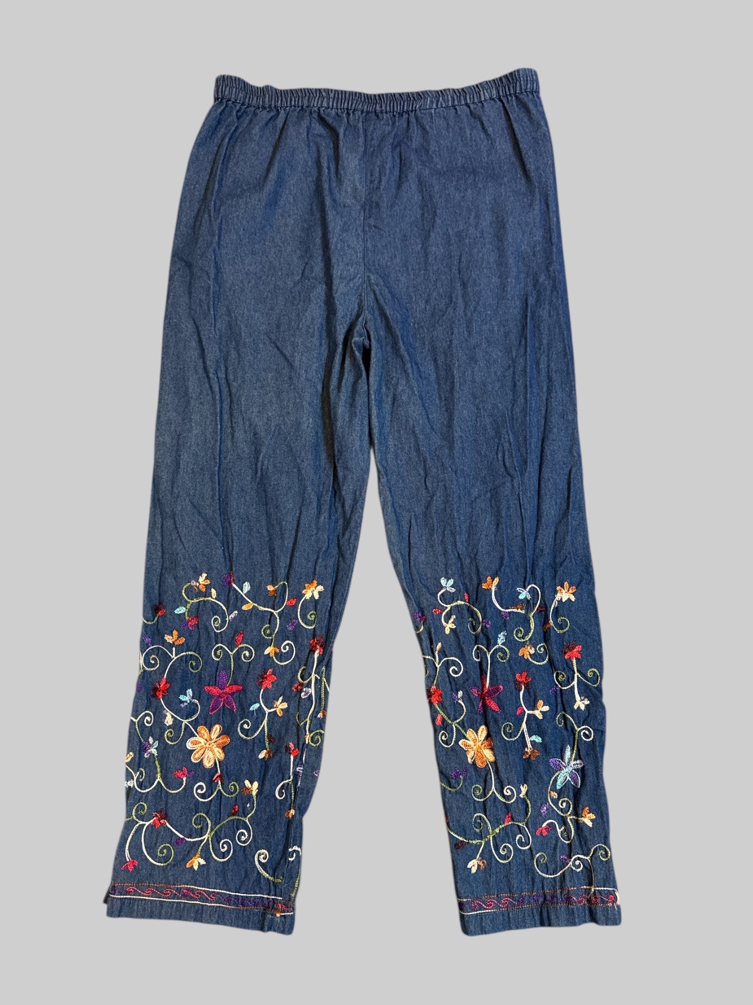 L vintage denim pants with embroidered bottoms and sides slit