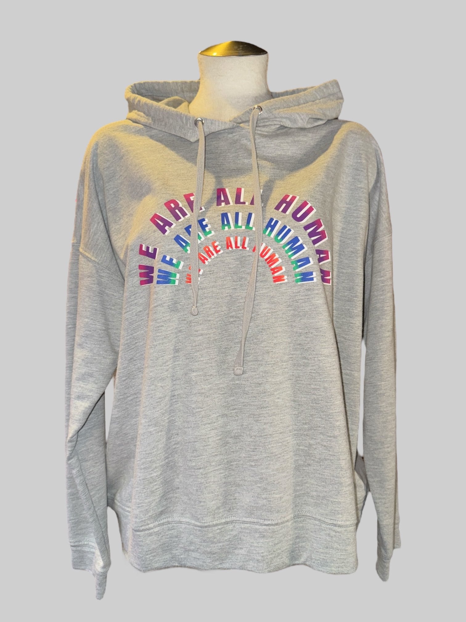 0X Heather Gray hoodie with “we are all human” graphic