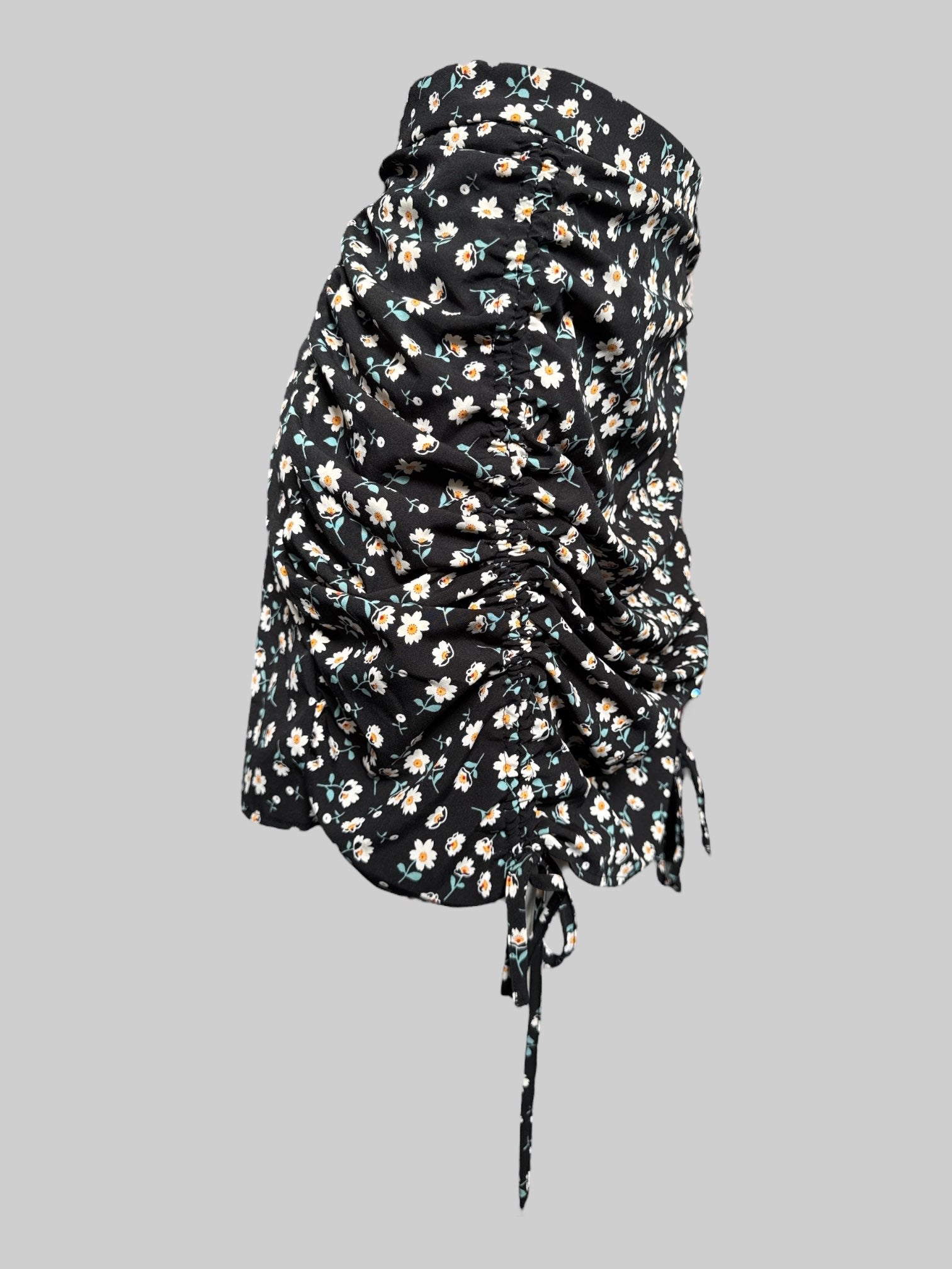 1X Black skirt with daisies and ruching in front with ties