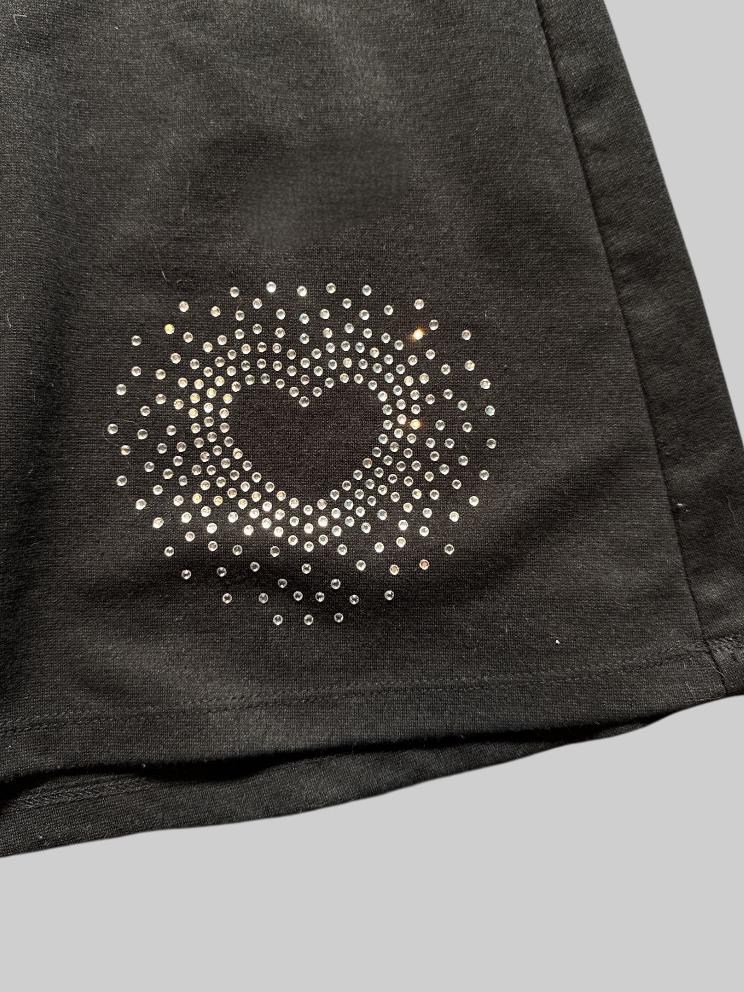 0X Black stretches skirt with bedazzled heart design