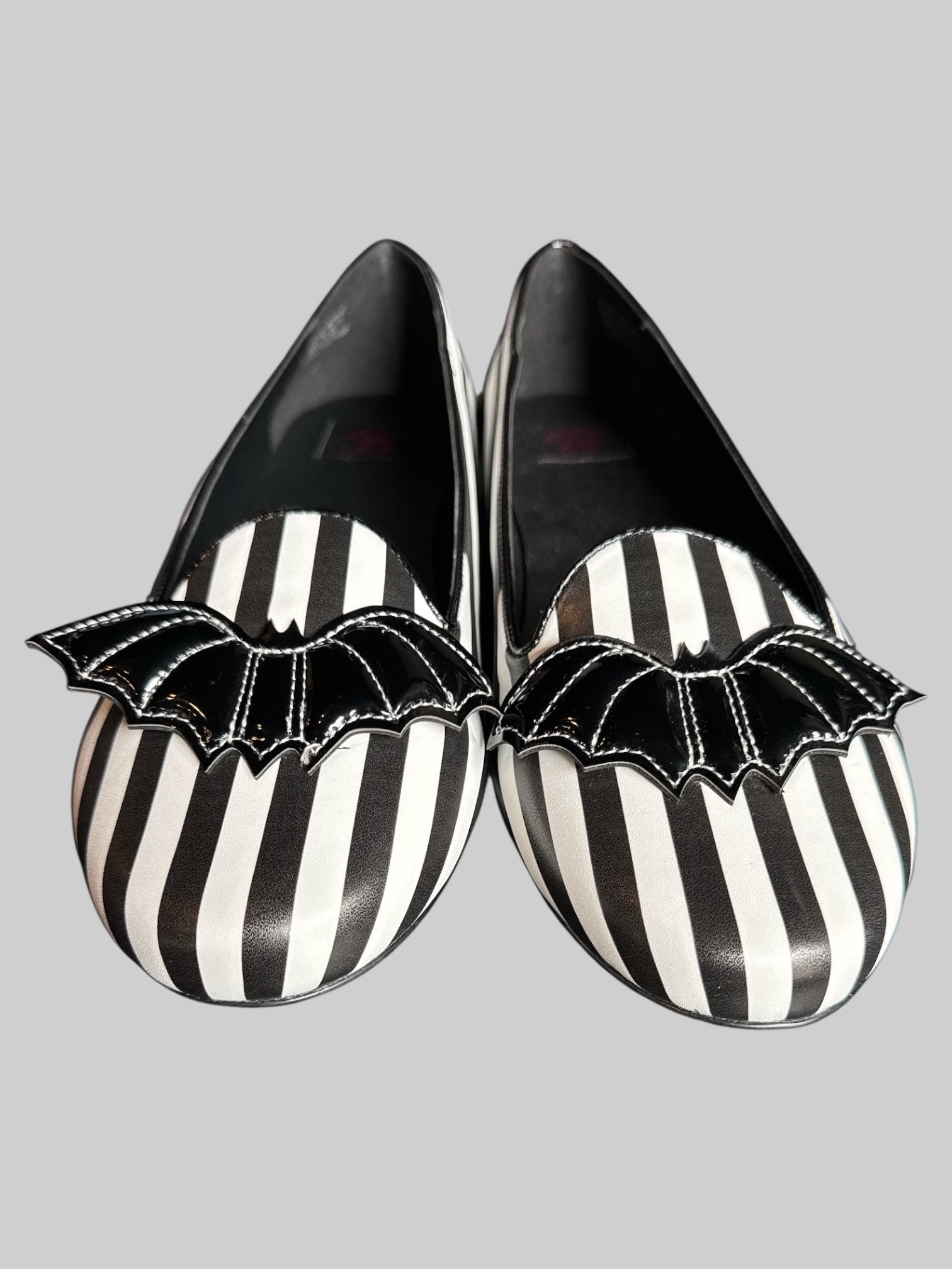 Size 13US black and white striped shoes with vinyl bats on toes