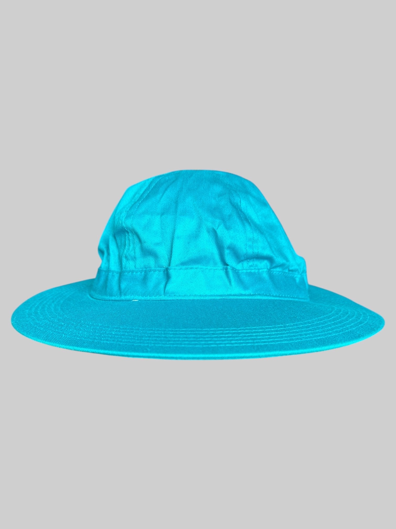 Light blue baseball cap style visor with elastic band on back