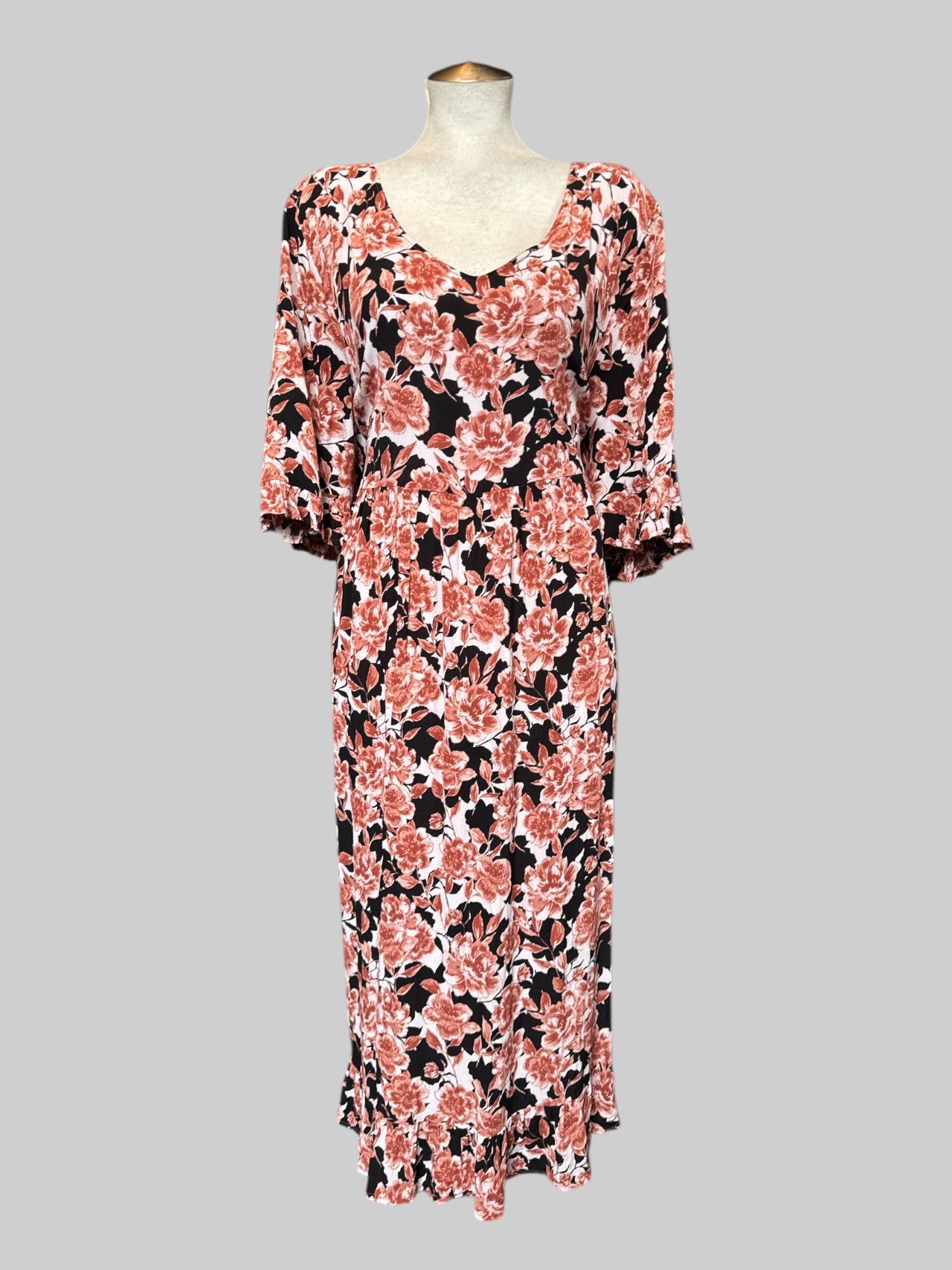 2X Black and white flowy dress with orange florals and ruffle hem
