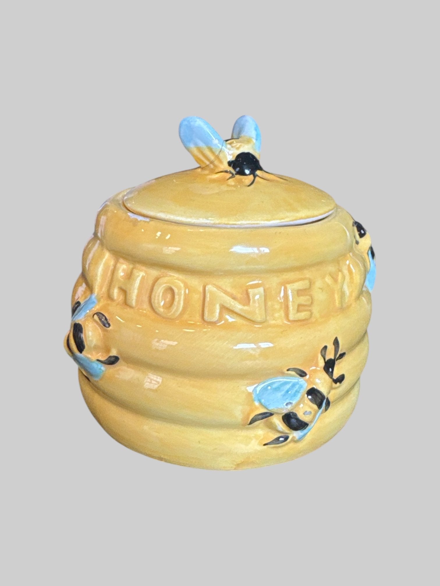 Ceramic beehive designed honey pot