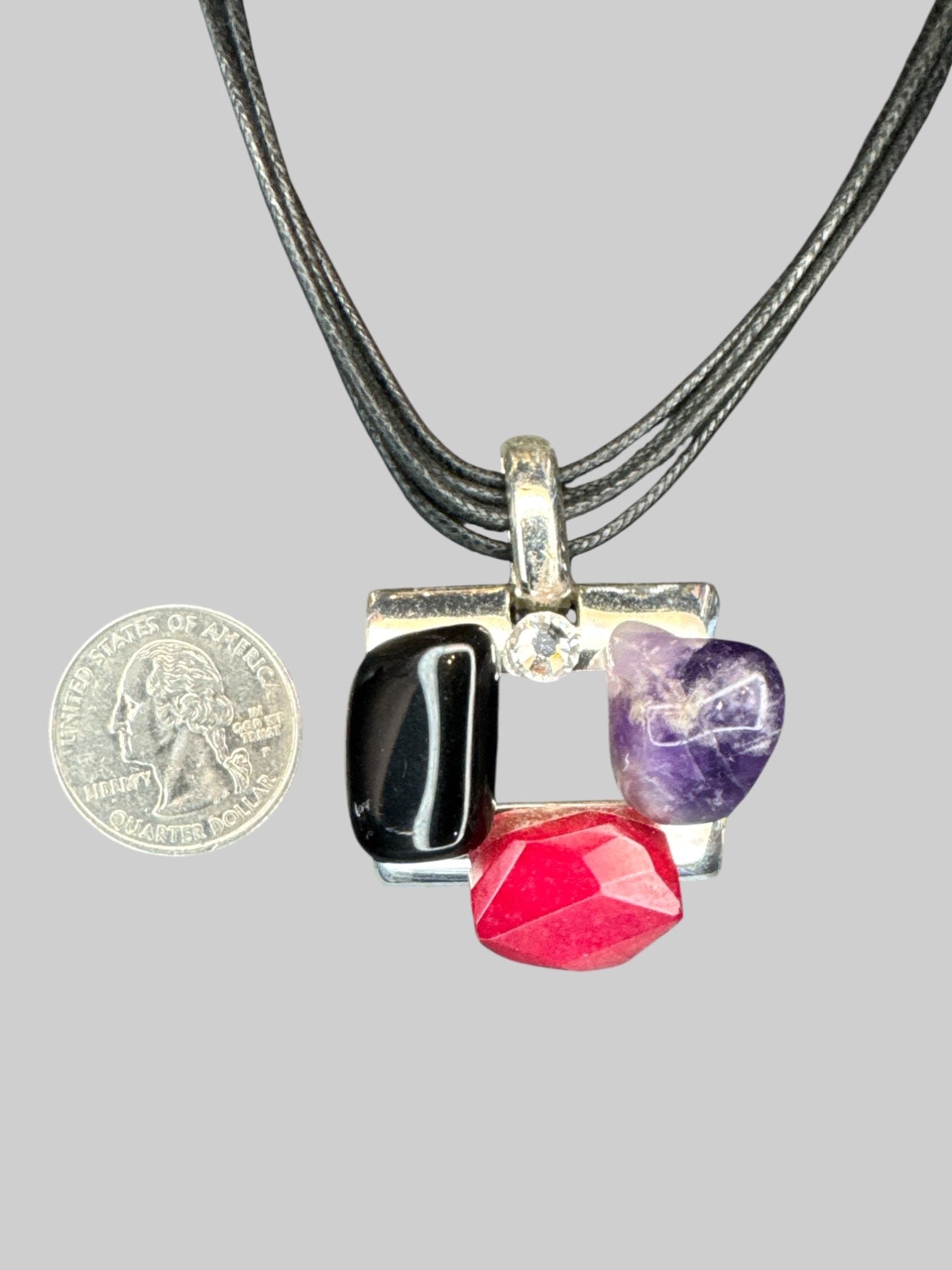 Adjustable necklace with multiple braided strands, and multi gemstone pendant