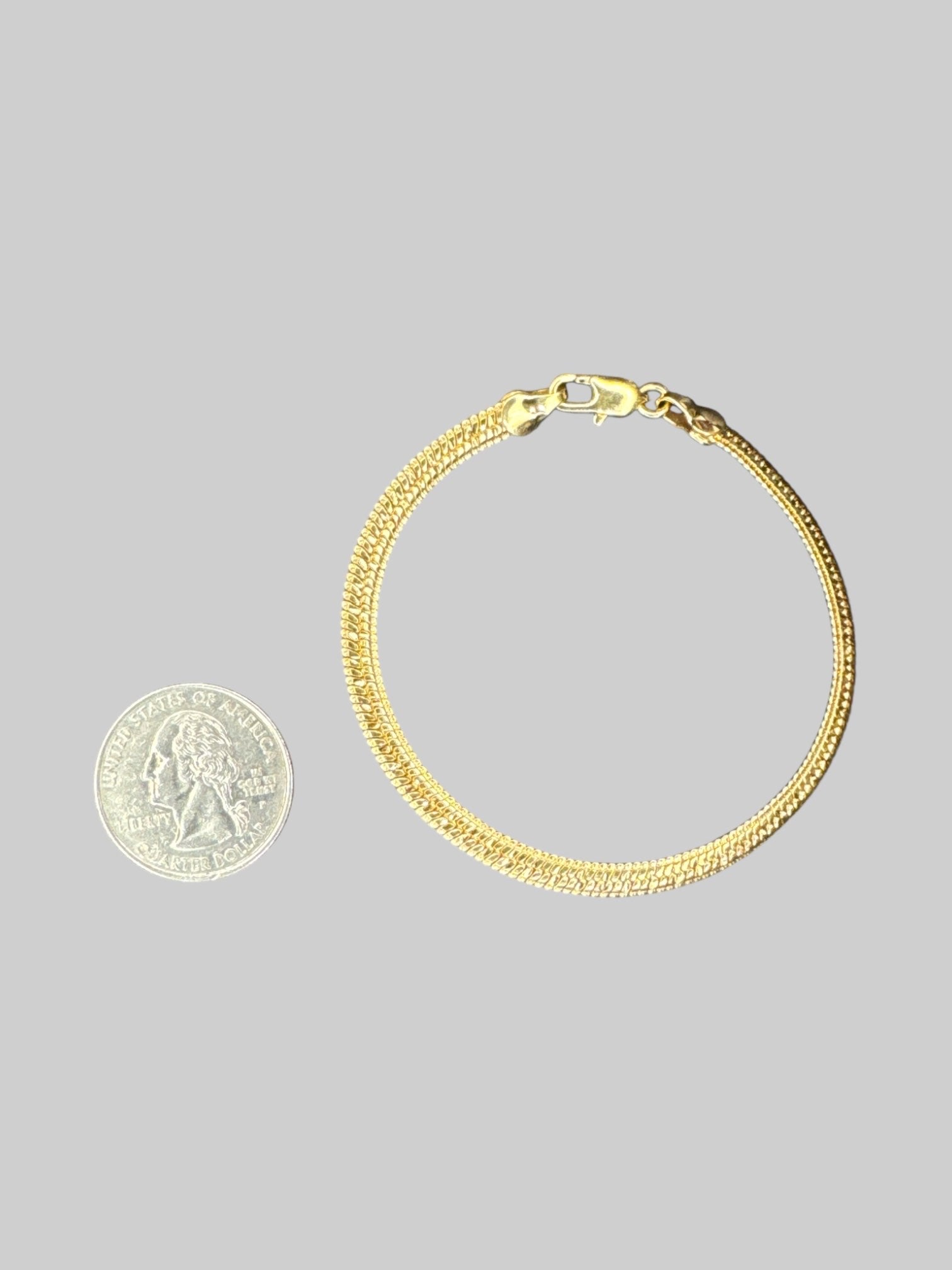 Vintage gold tone braided bracelet