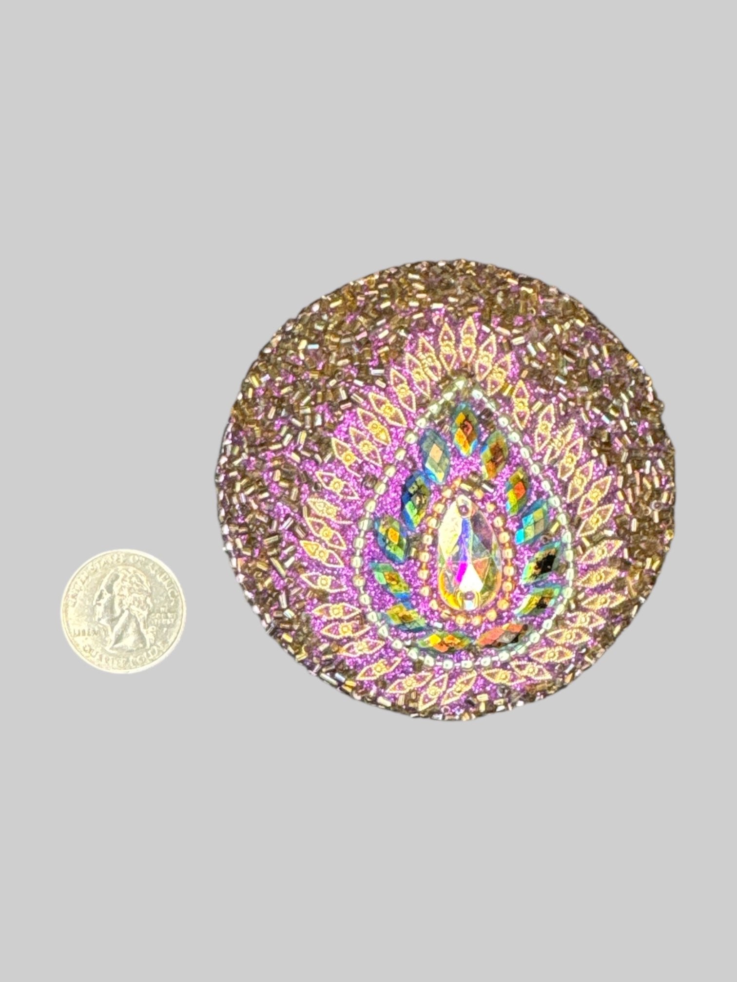 Purple, gold, and iridescent bedazzled metal box