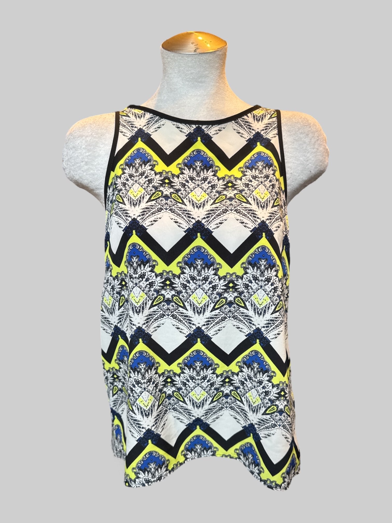 M Black, white, yellow, and blue sleeveless top with geometric, ornate design and split panel back