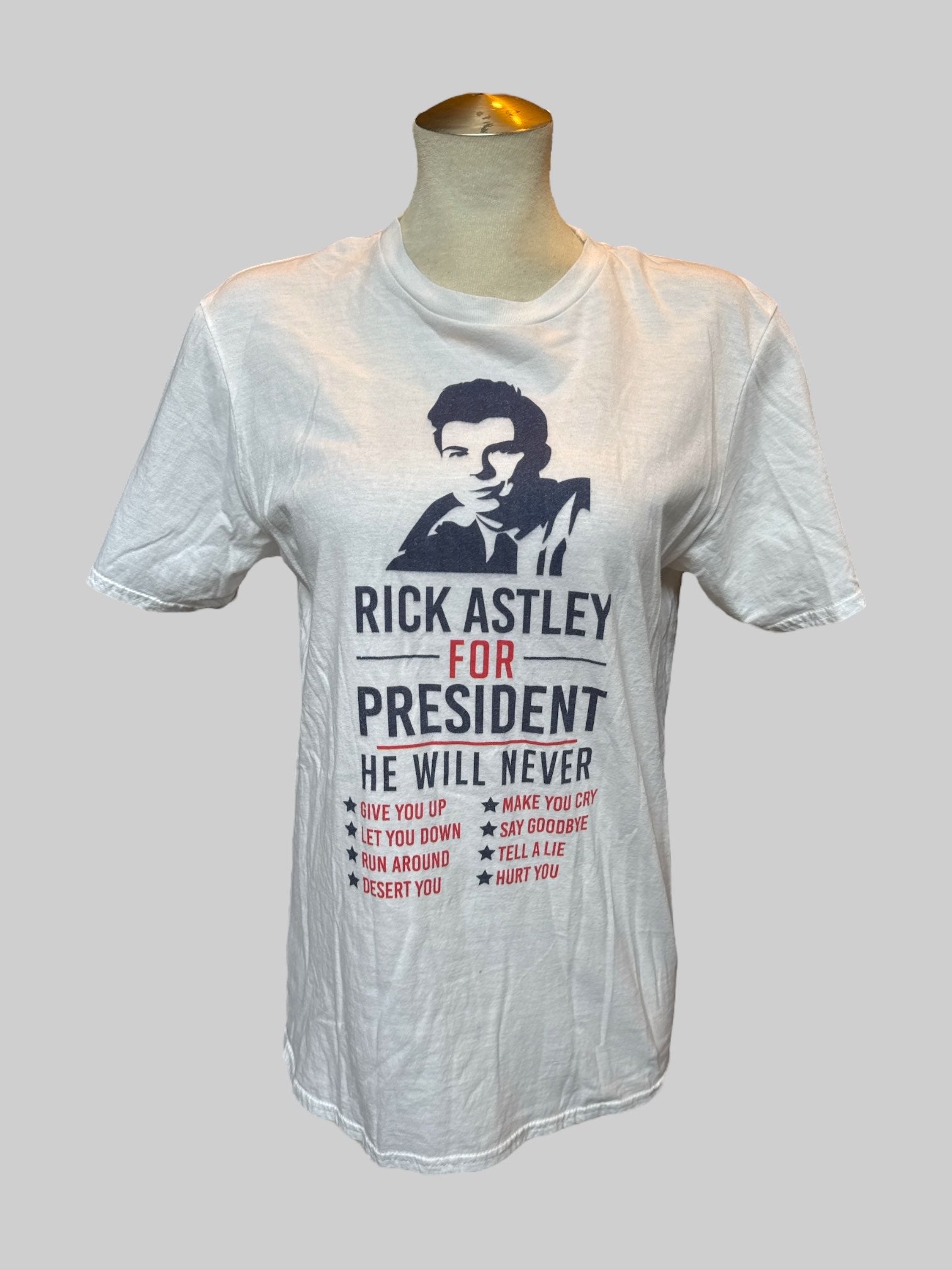 M White T-shirt with “ Rick Ashley for president” graphic