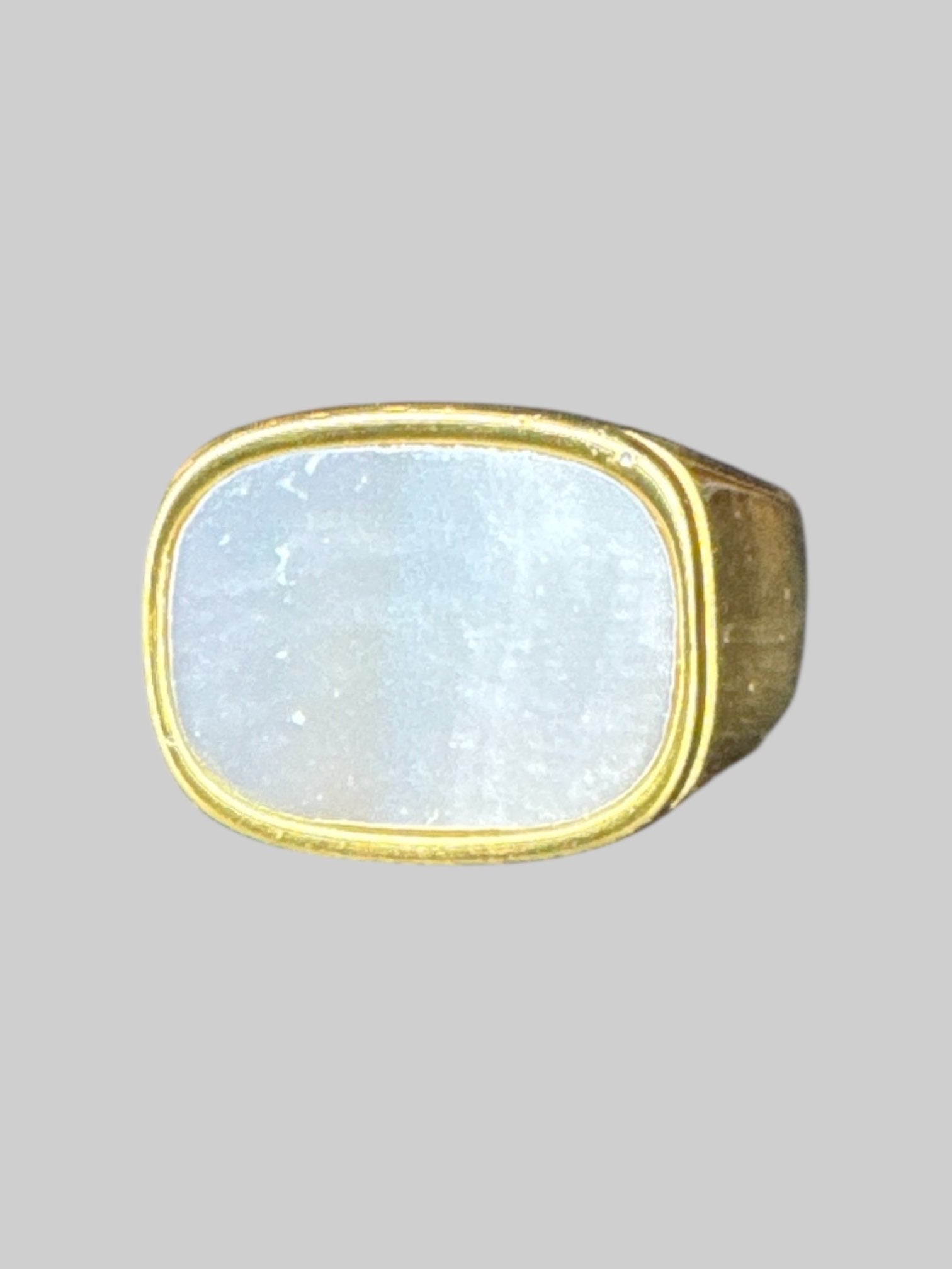 Size 9 mother of pearl gold colored ring