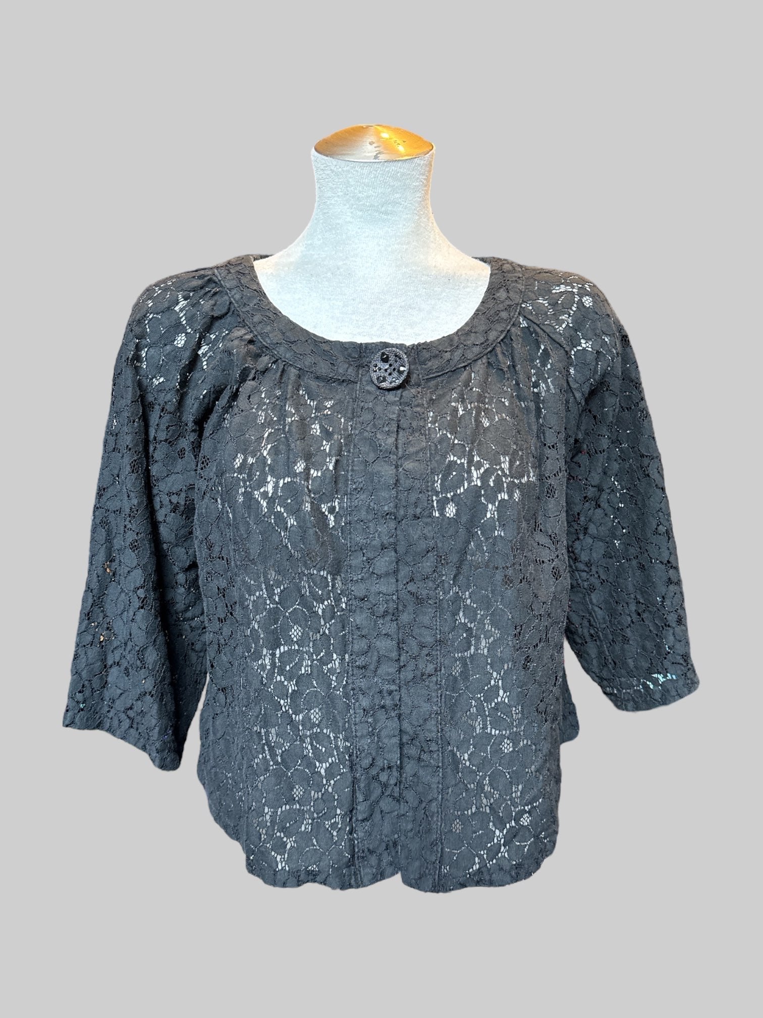 L Black lacy sweater with one rhinestoned top button