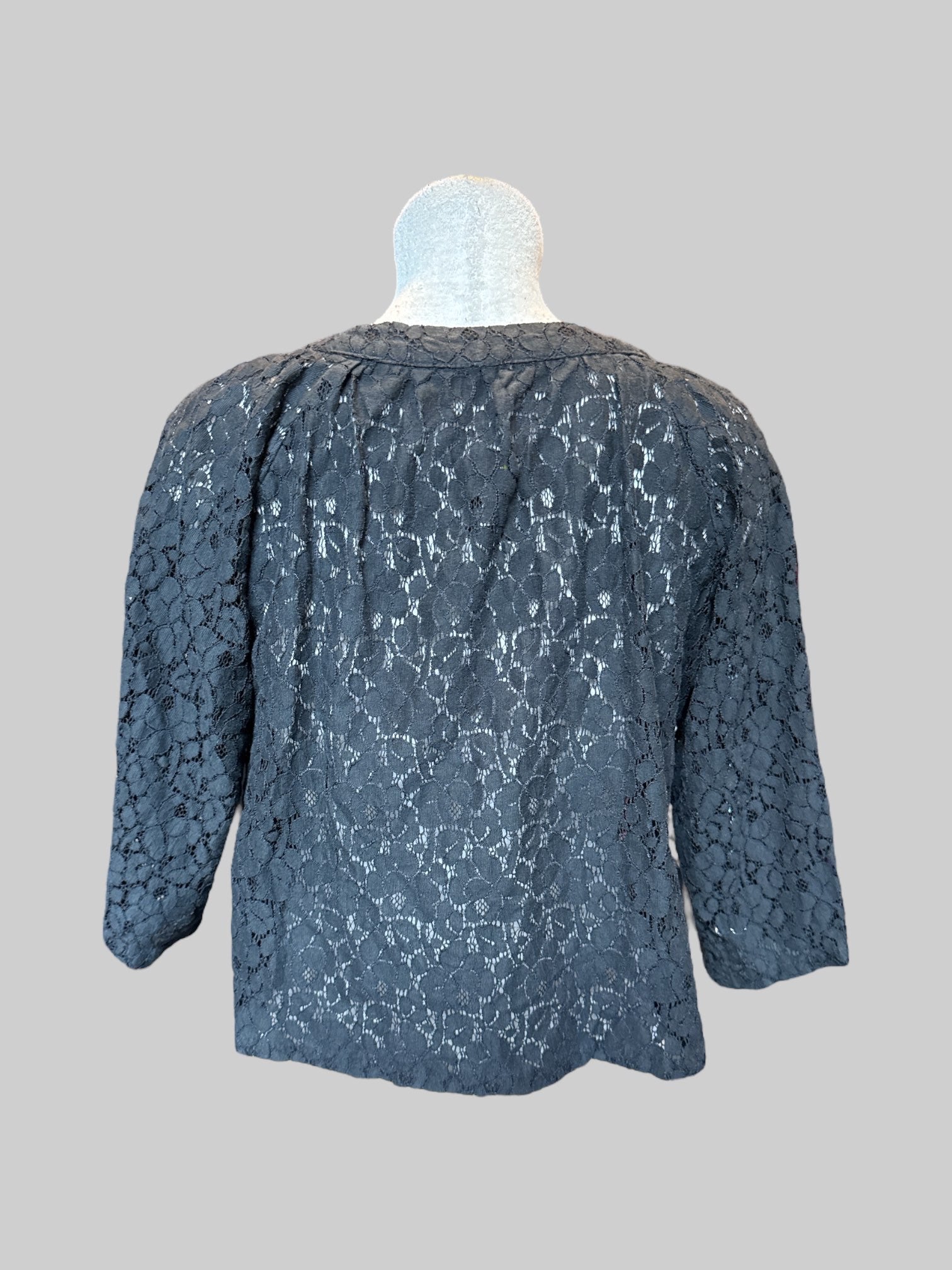 L Black lacy sweater with one rhinestoned top button
