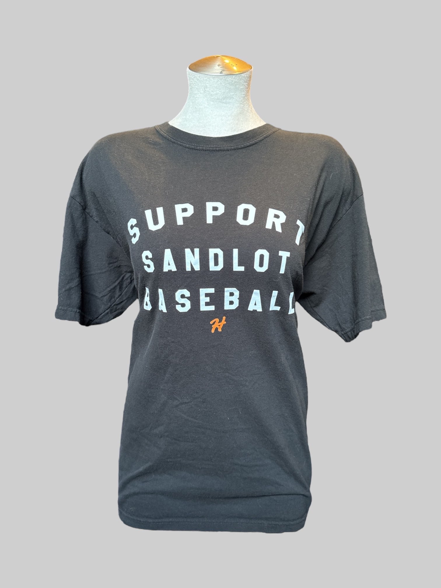 L Black T-shirt with “Support sandlot baseball” graphic