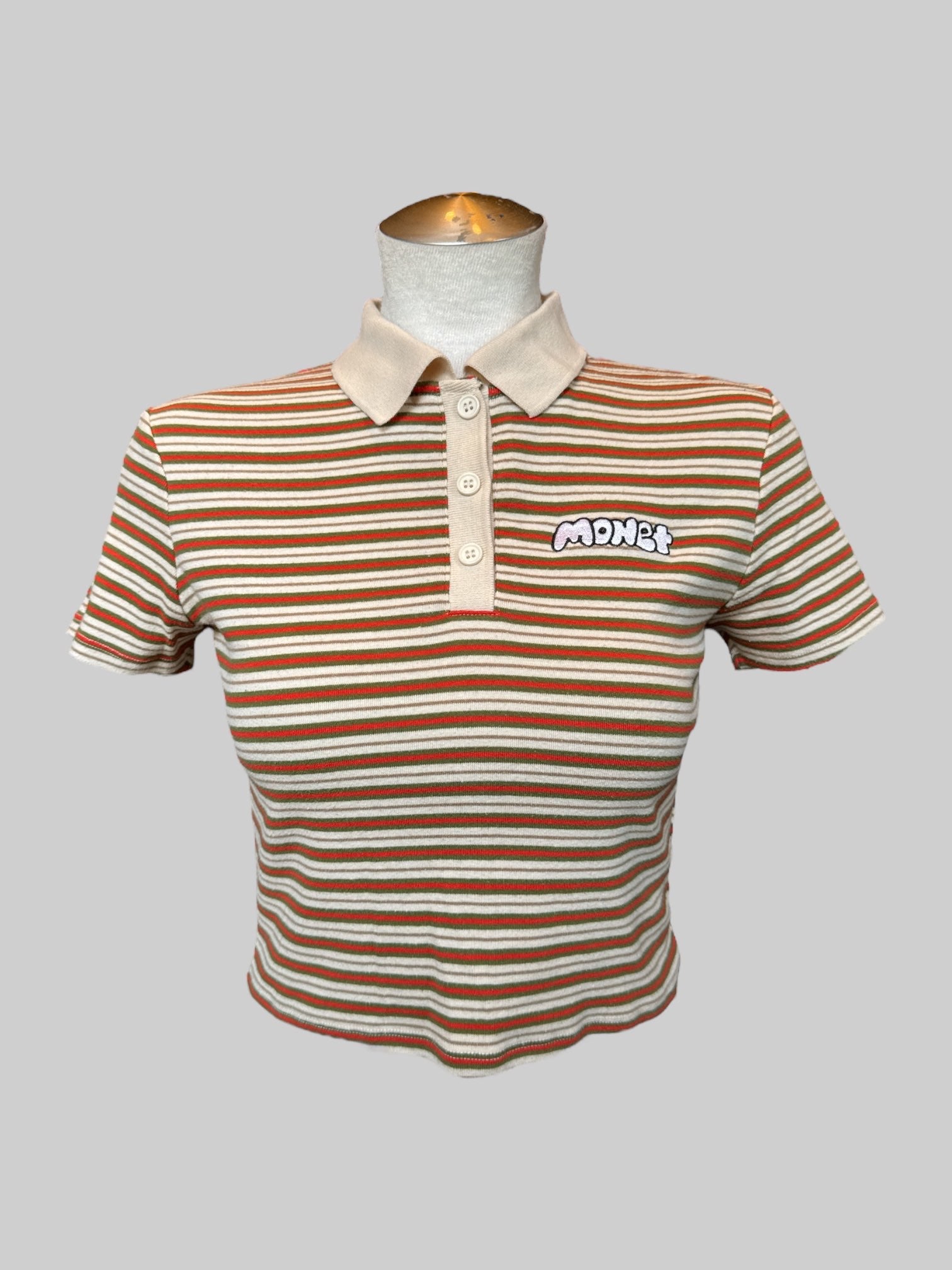 L Cream, orange, green and brown crop top polo with “ Monet” embroidery