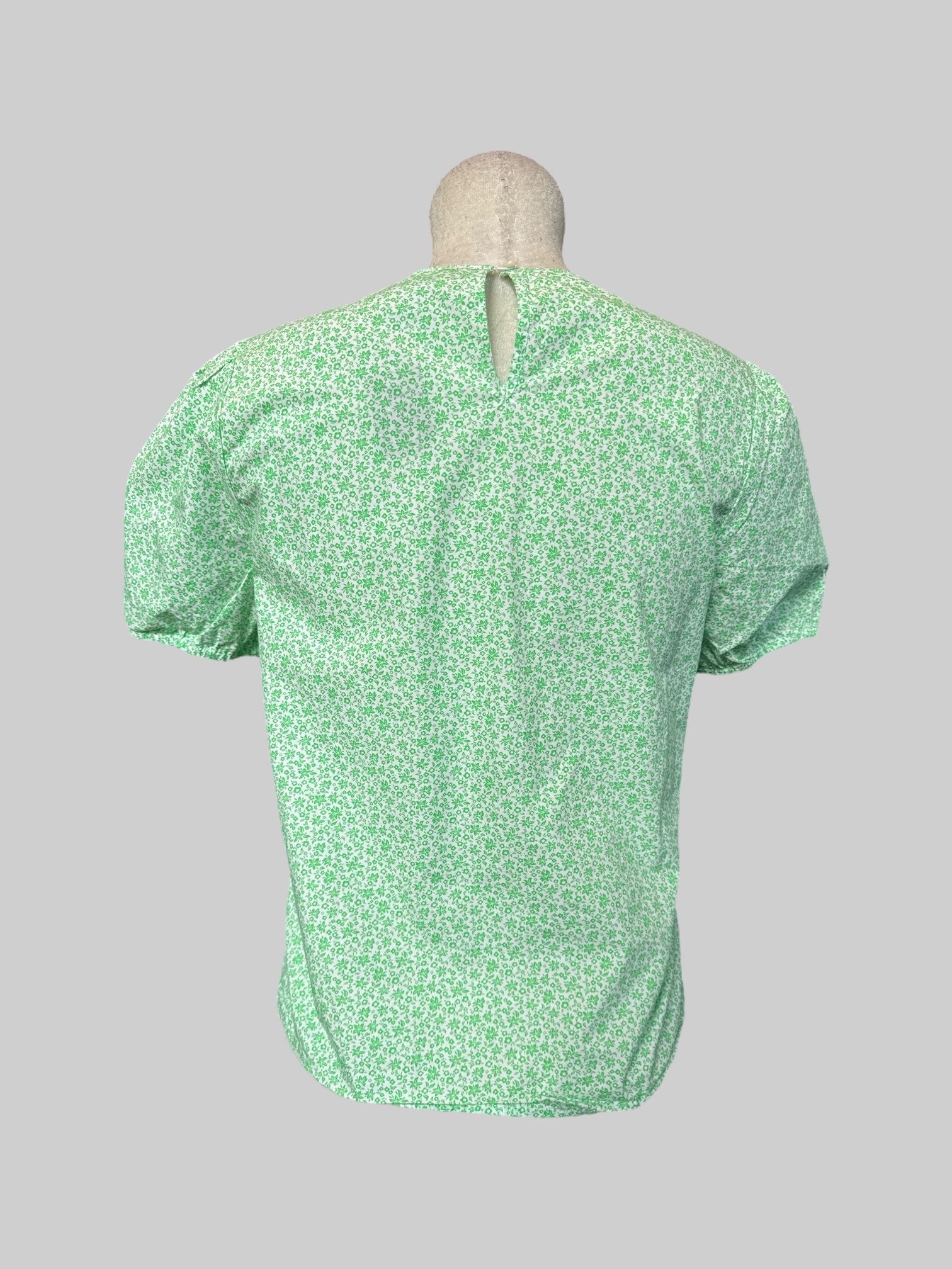 L White and green floral top with balloon sleeves and keyhole and back