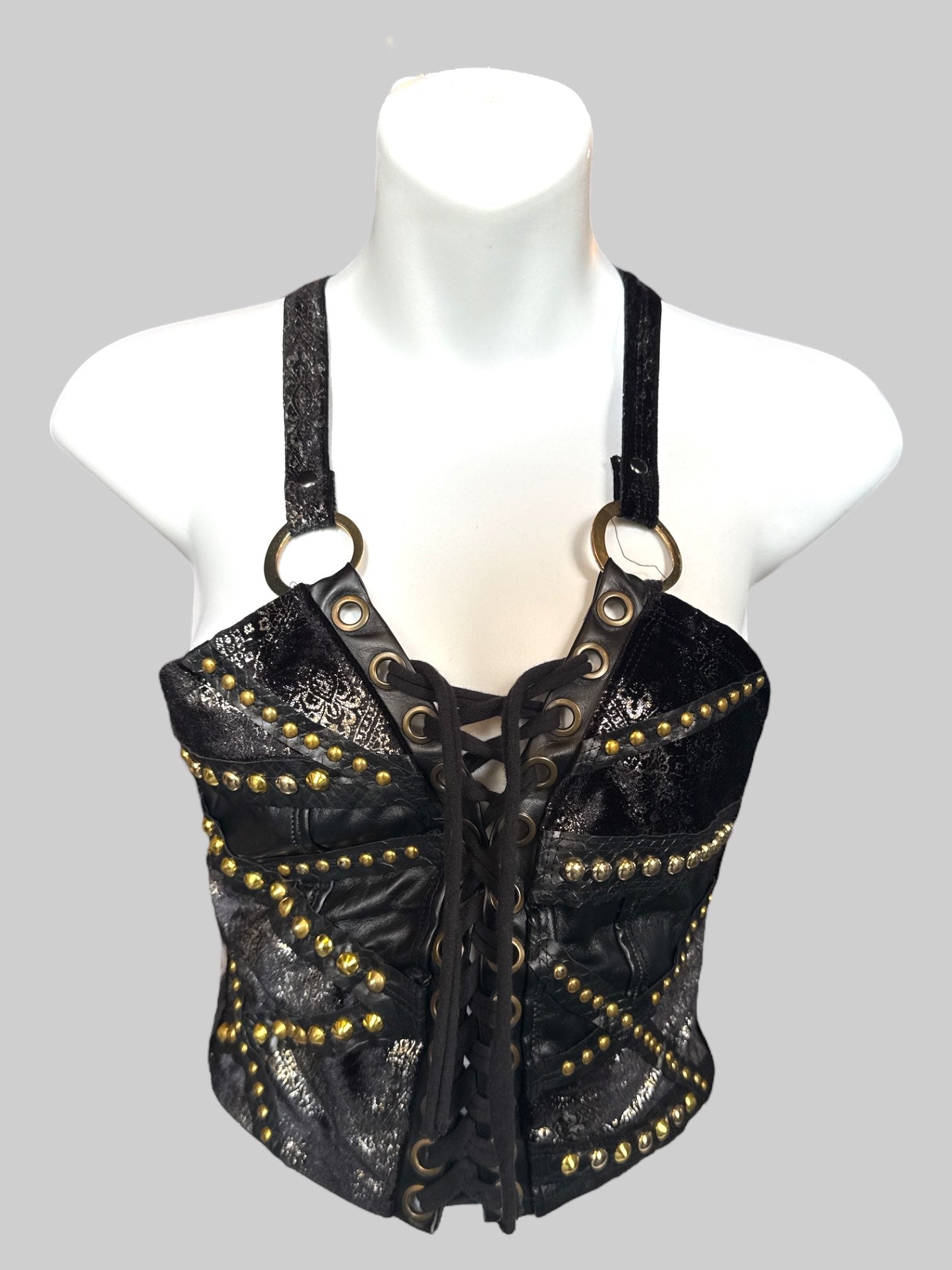 S Black lace up sleeveless top with gold color studs, black velvet with shimmery design and O ring straps that cross in the back