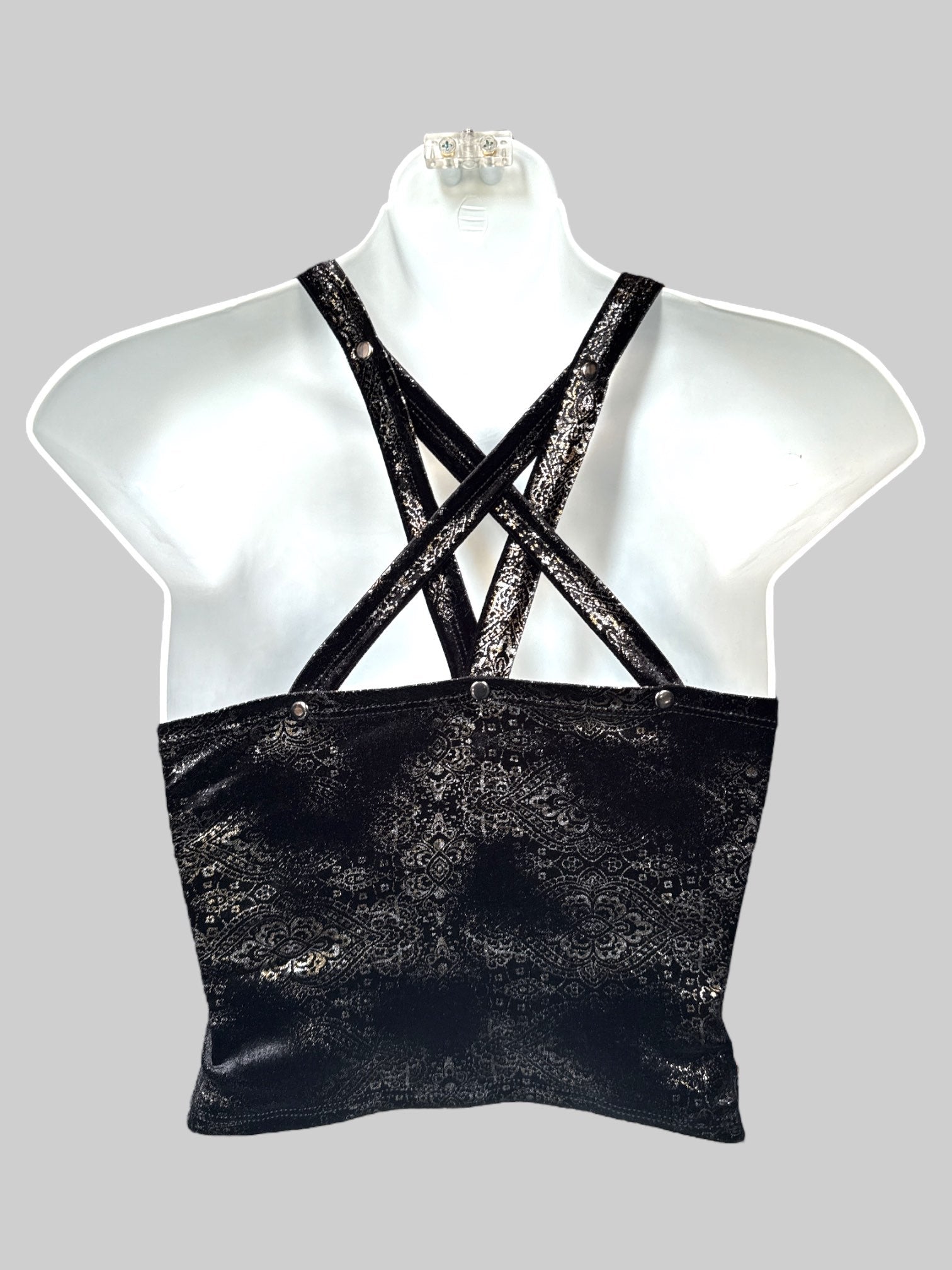S Black lace up sleeveless top with gold color studs, black velvet with shimmery design and O ring straps that cross in the back