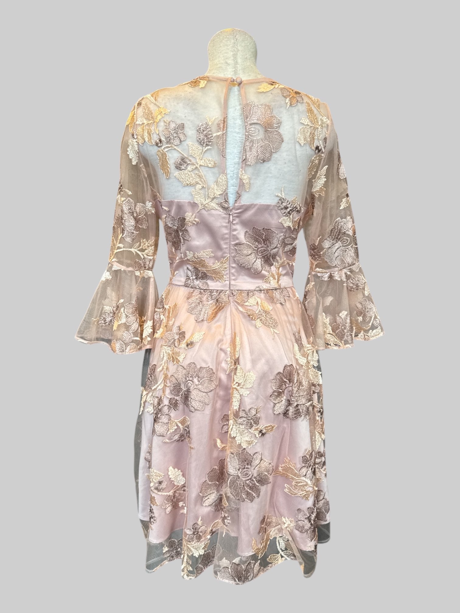 L Pink floral dress with bell sleeves, and outer tulle layer
