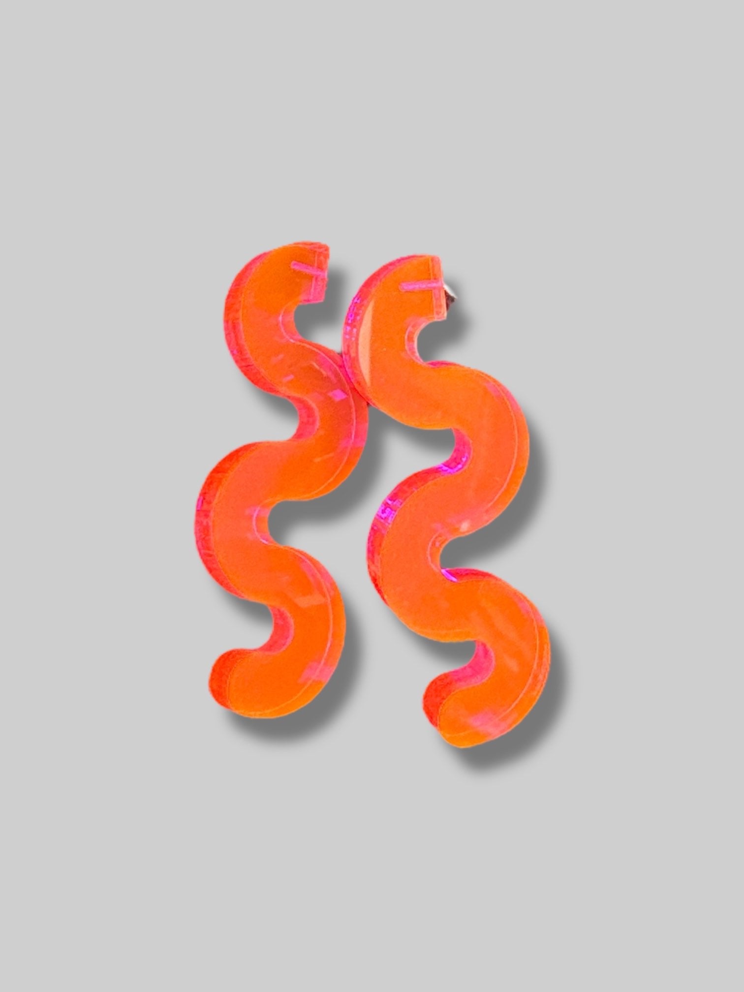 Pink/orange squiggly translucent earrings