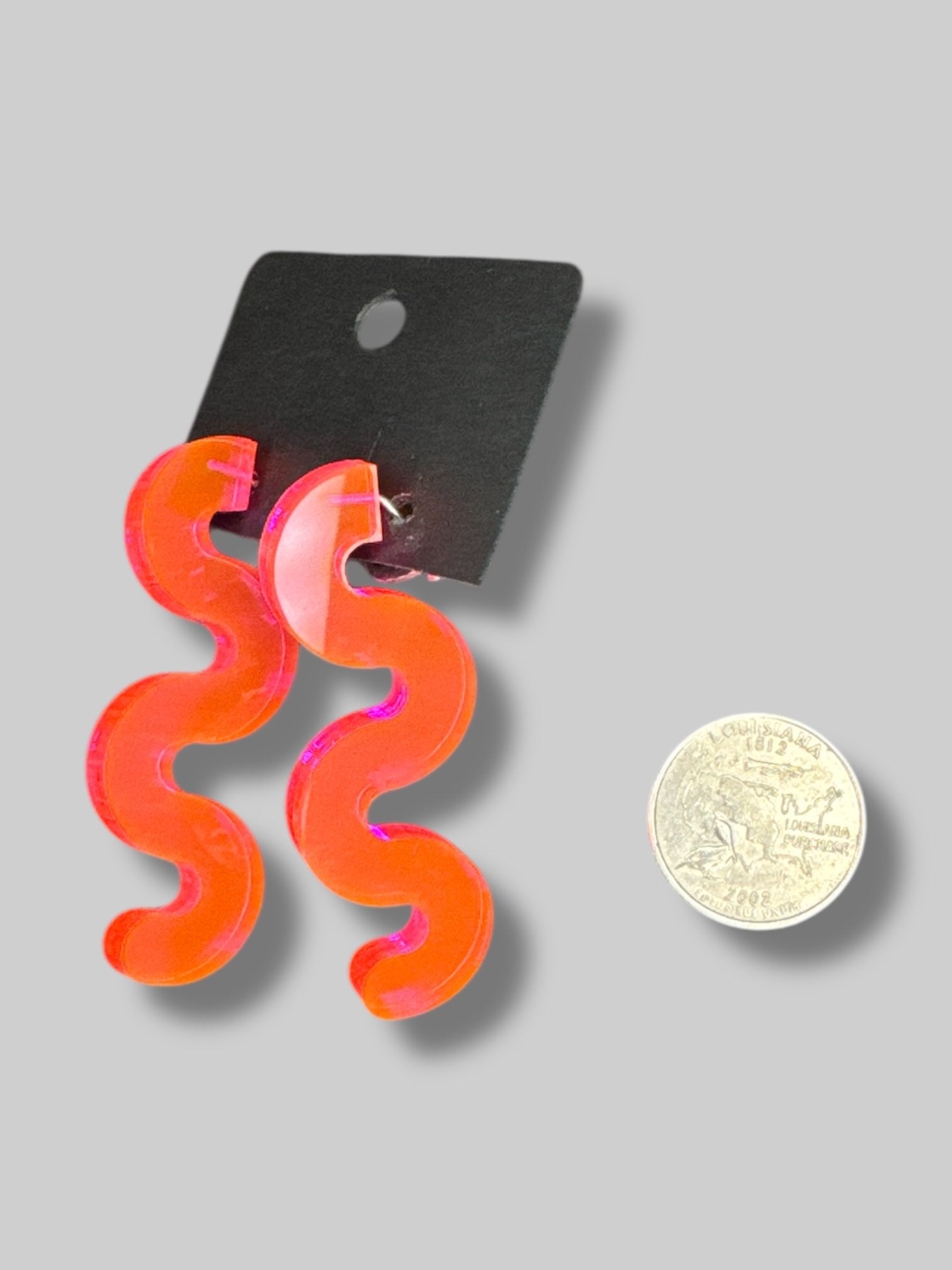 Pink/orange squiggly translucent earrings