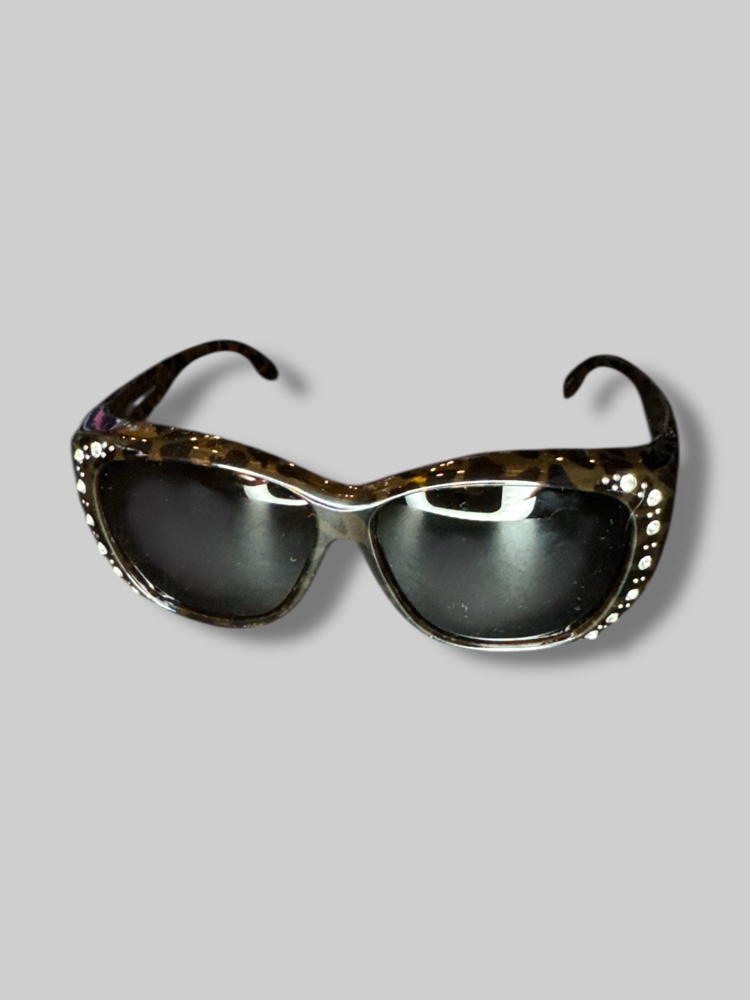 Large tortoiseshell sunglasses with bedazzled details