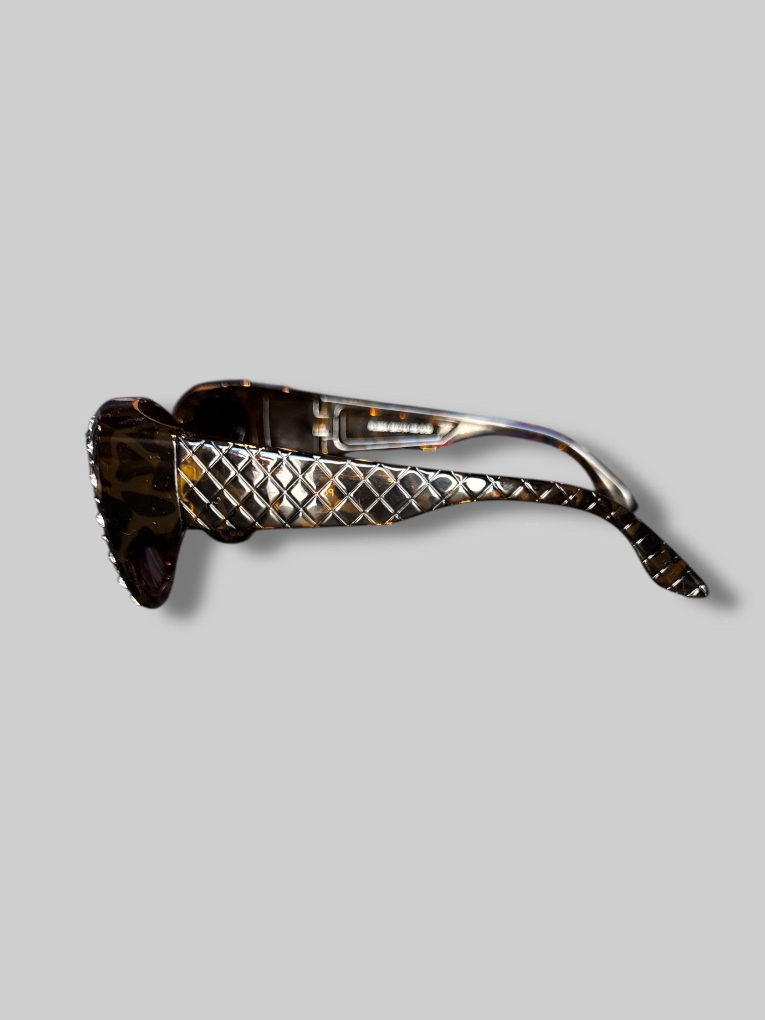 Large tortoiseshell sunglasses with bedazzled details