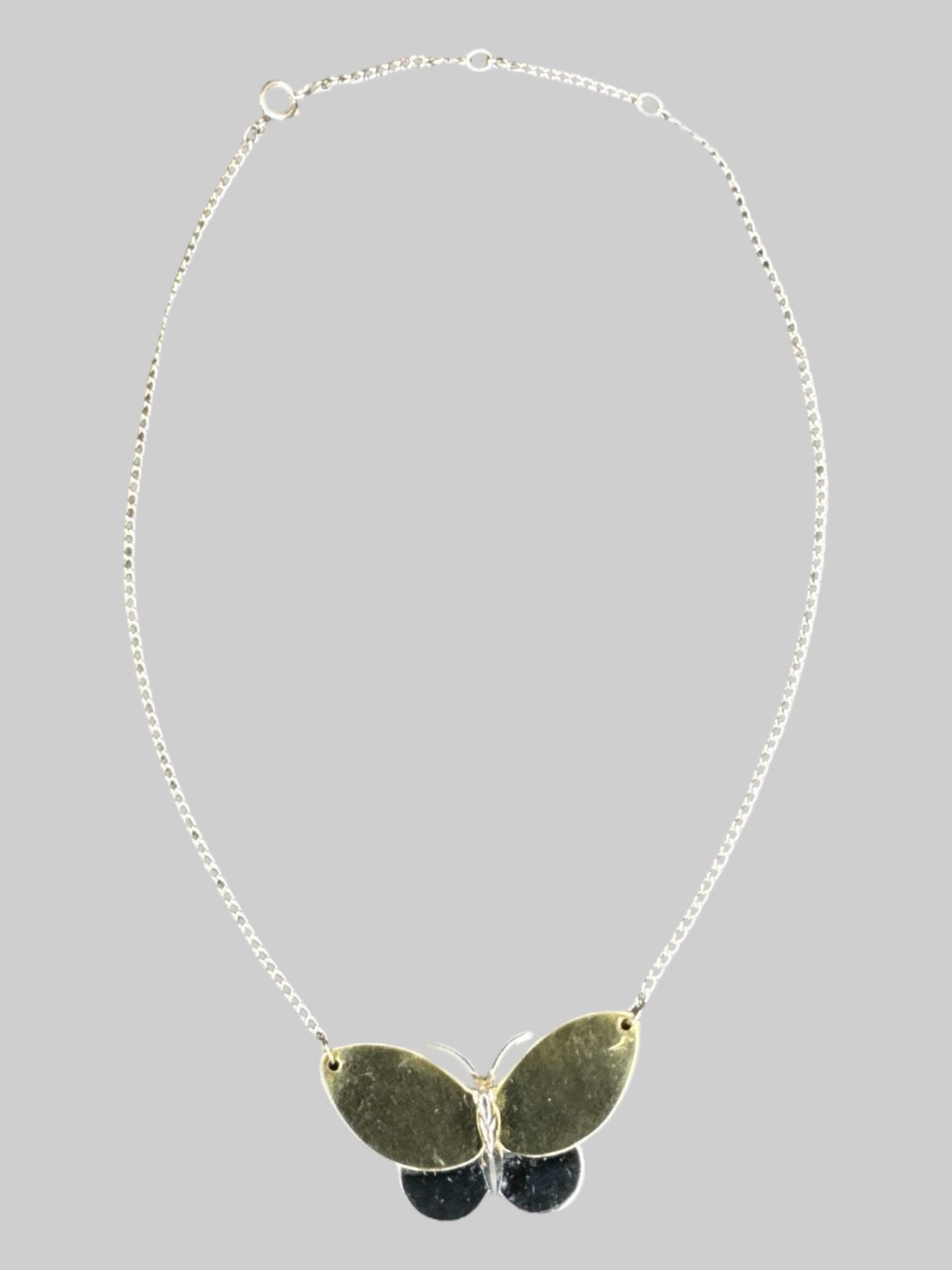 Vintage Avon chain necklace with gold and silver toned butterfly pendant
