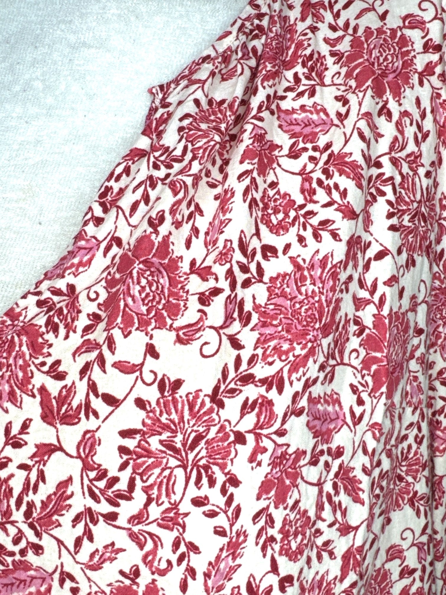 L Red and white top with ruffle sleeves and botanical pattern