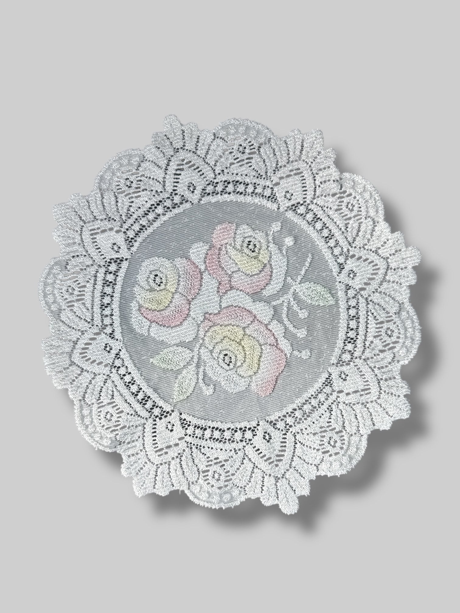 Vintage round lace doily with rose design
