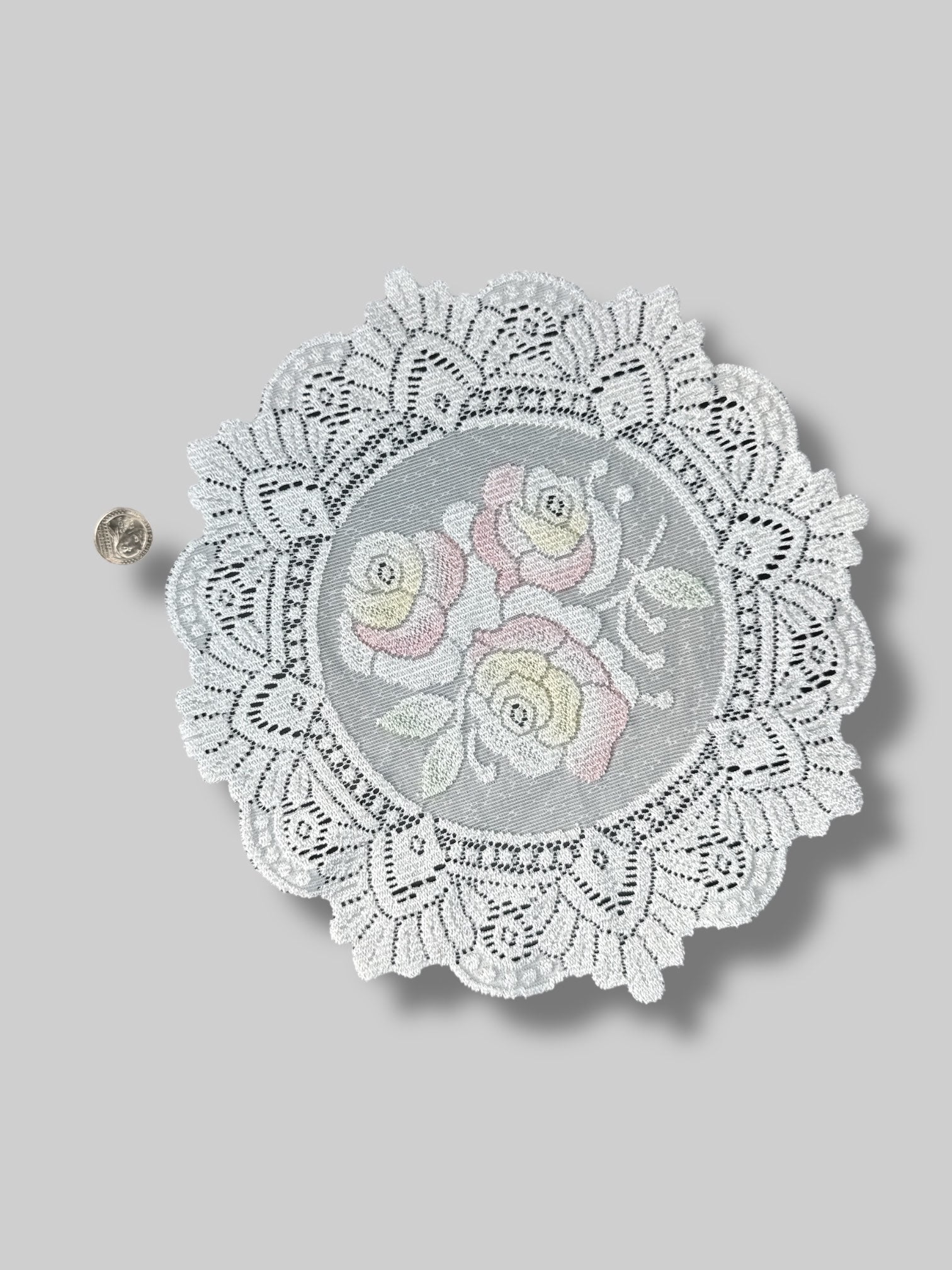 Vintage round lace doily with rose design